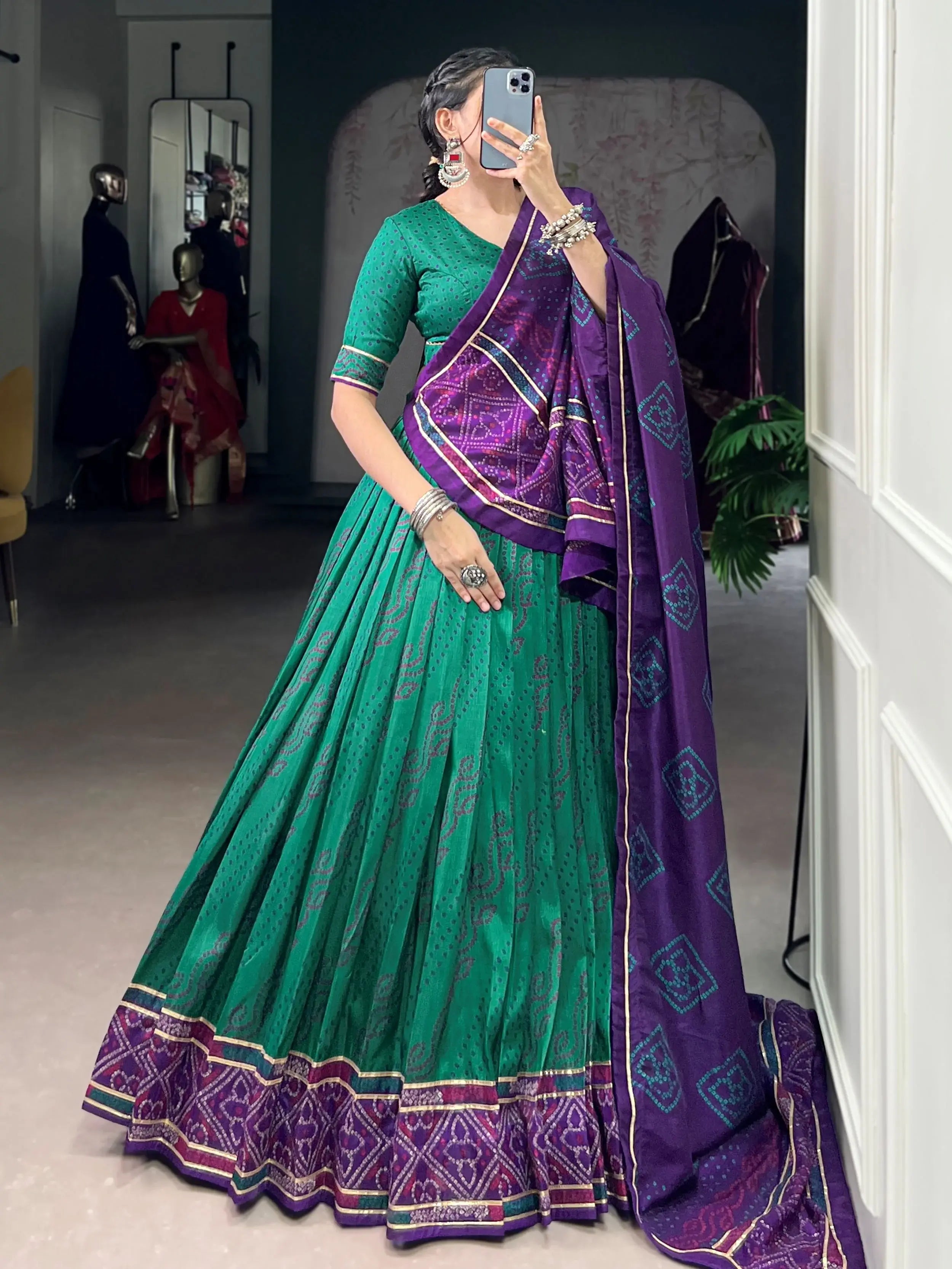 Green silk bandhani print lehenga choli with gotta patti lace work