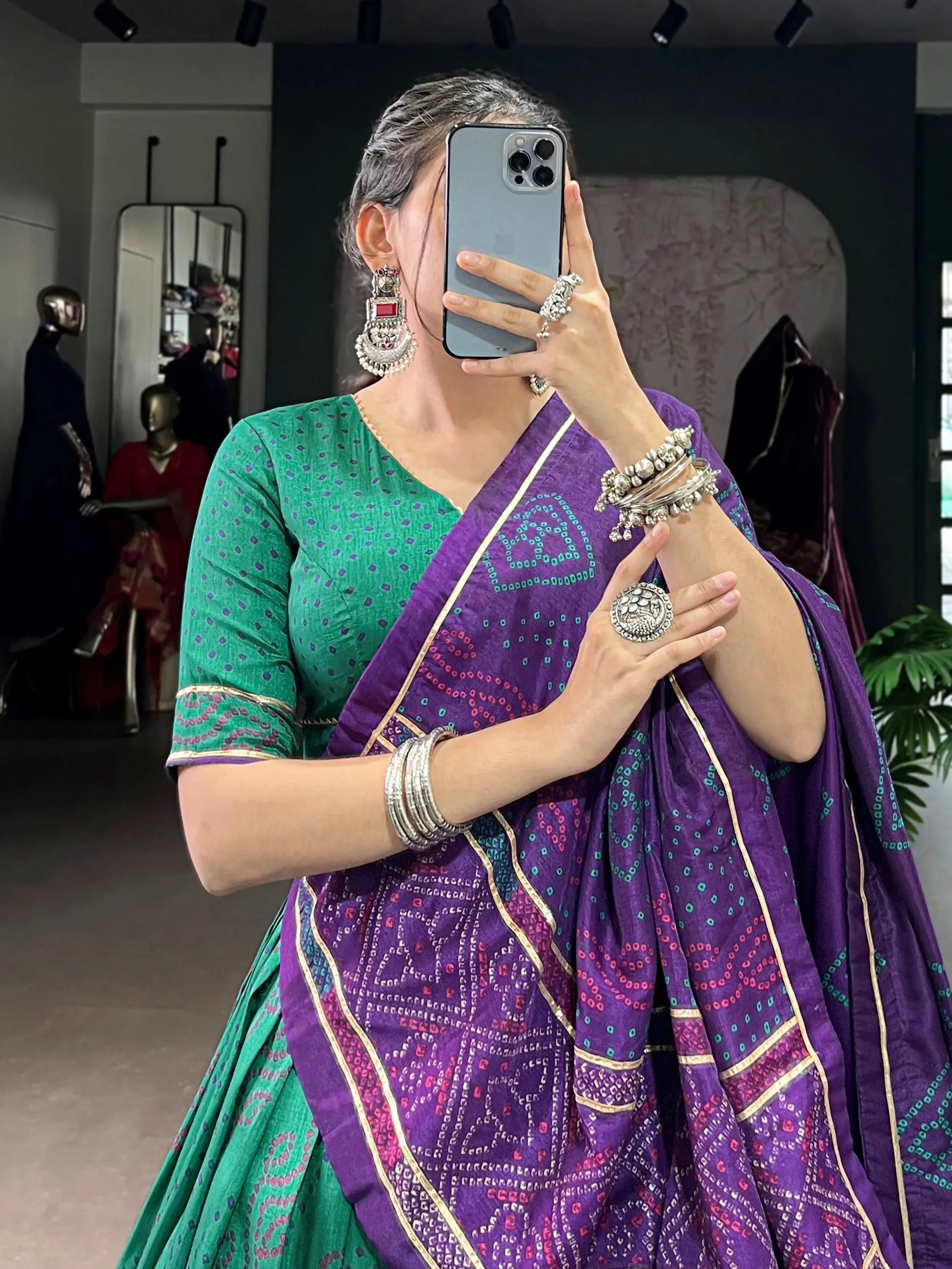 Green silk bandhani print lehenga choli with gotta patti lace work