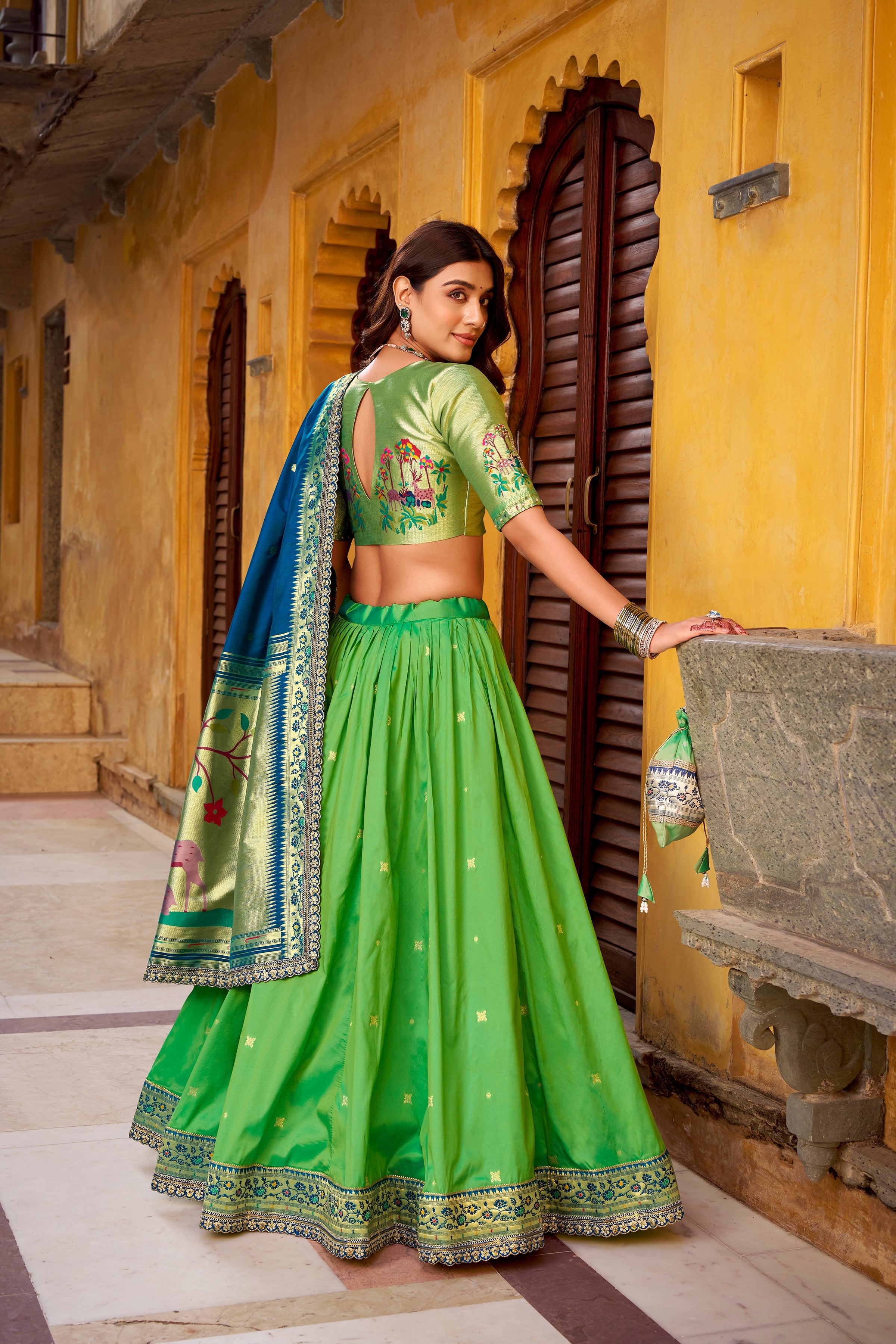 Hamsini parrot green soft silk Paithani lehenga choli with zari embroidered work