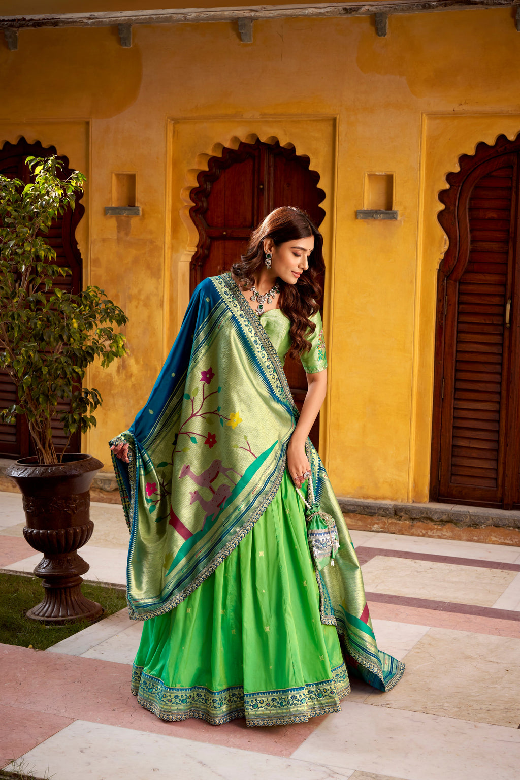 Hamsini parrot green soft silk Paithani lehenga choli with zari embroidered work