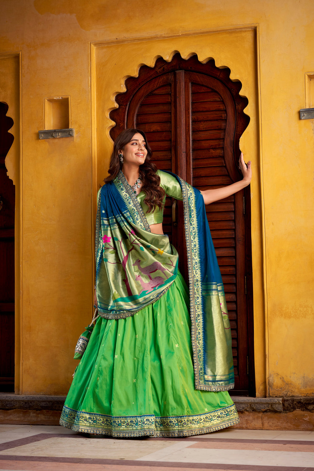 Hamsini parrot green soft silk Paithani lehenga choli with zari embroidered work