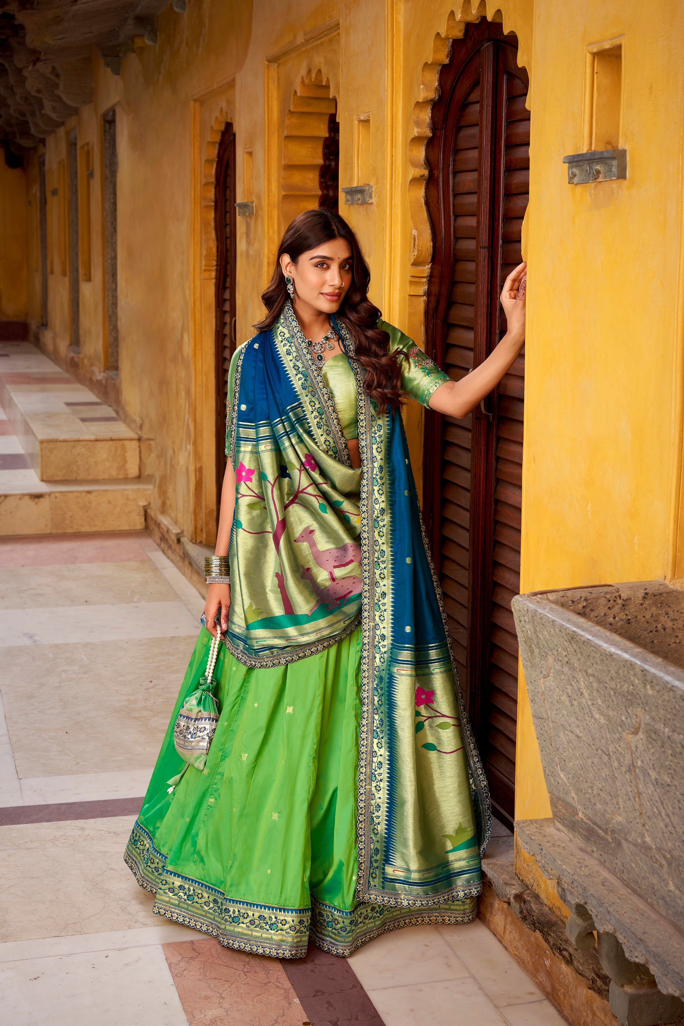 Hamsini parrot green soft silk Paithani lehenga choli with zari embroidered work