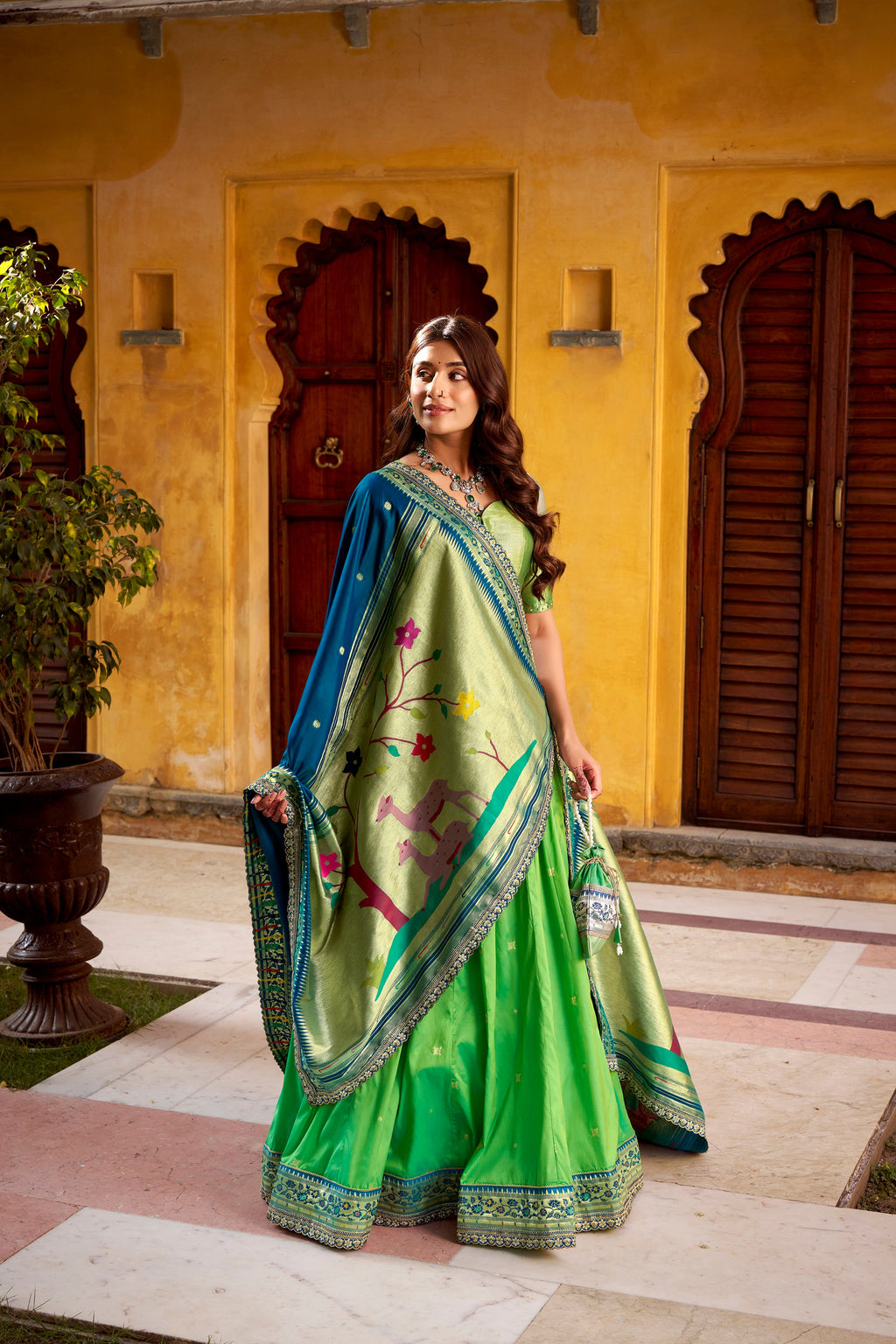 Hamsini parrot green soft silk Paithani lehenga choli with zari embroidered work