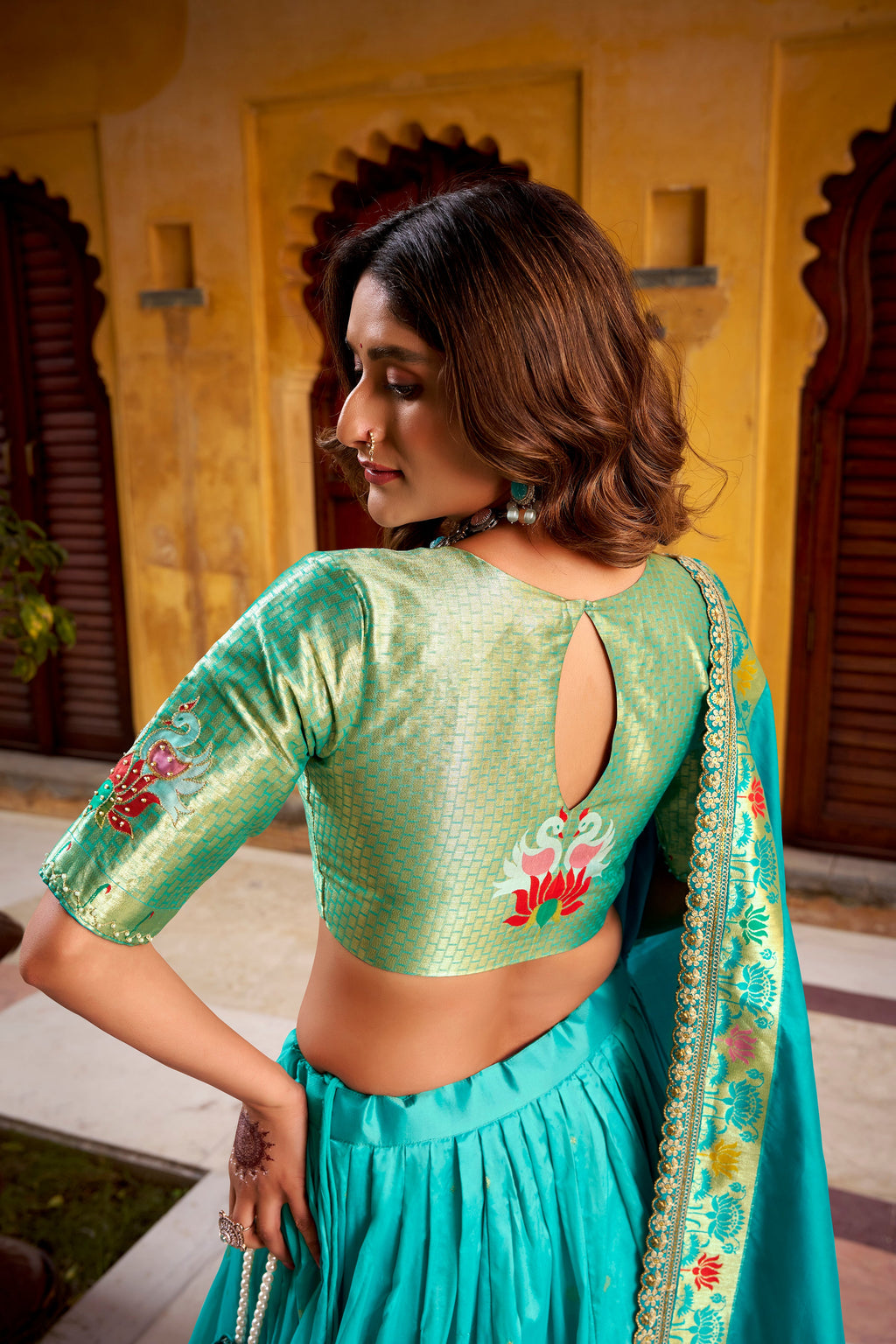 Hamsini sky blue soft silk Paithani lehenga choli with zari embroidered work