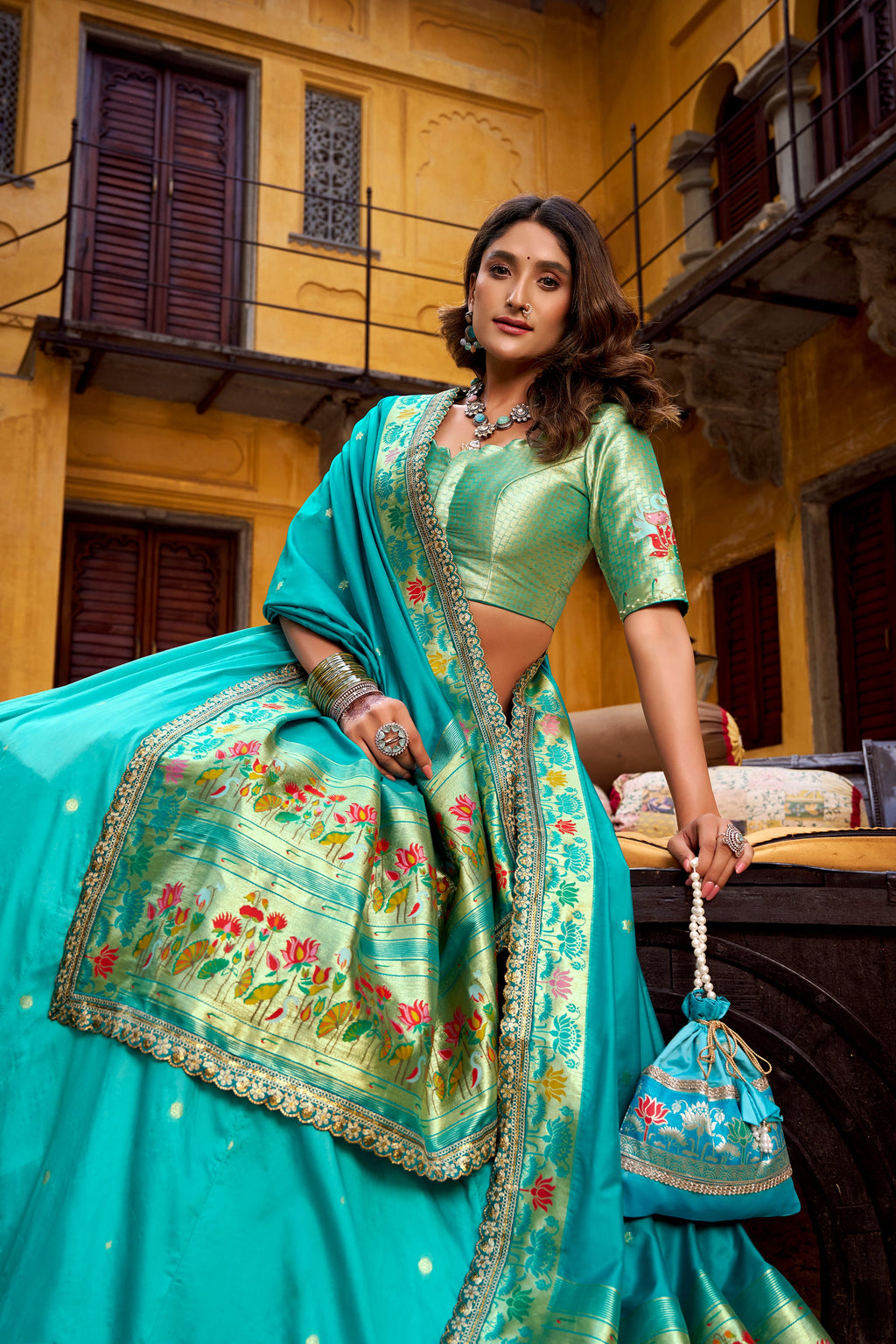 Hamsini sky blue soft silk Paithani lehenga choli with zari embroidered work