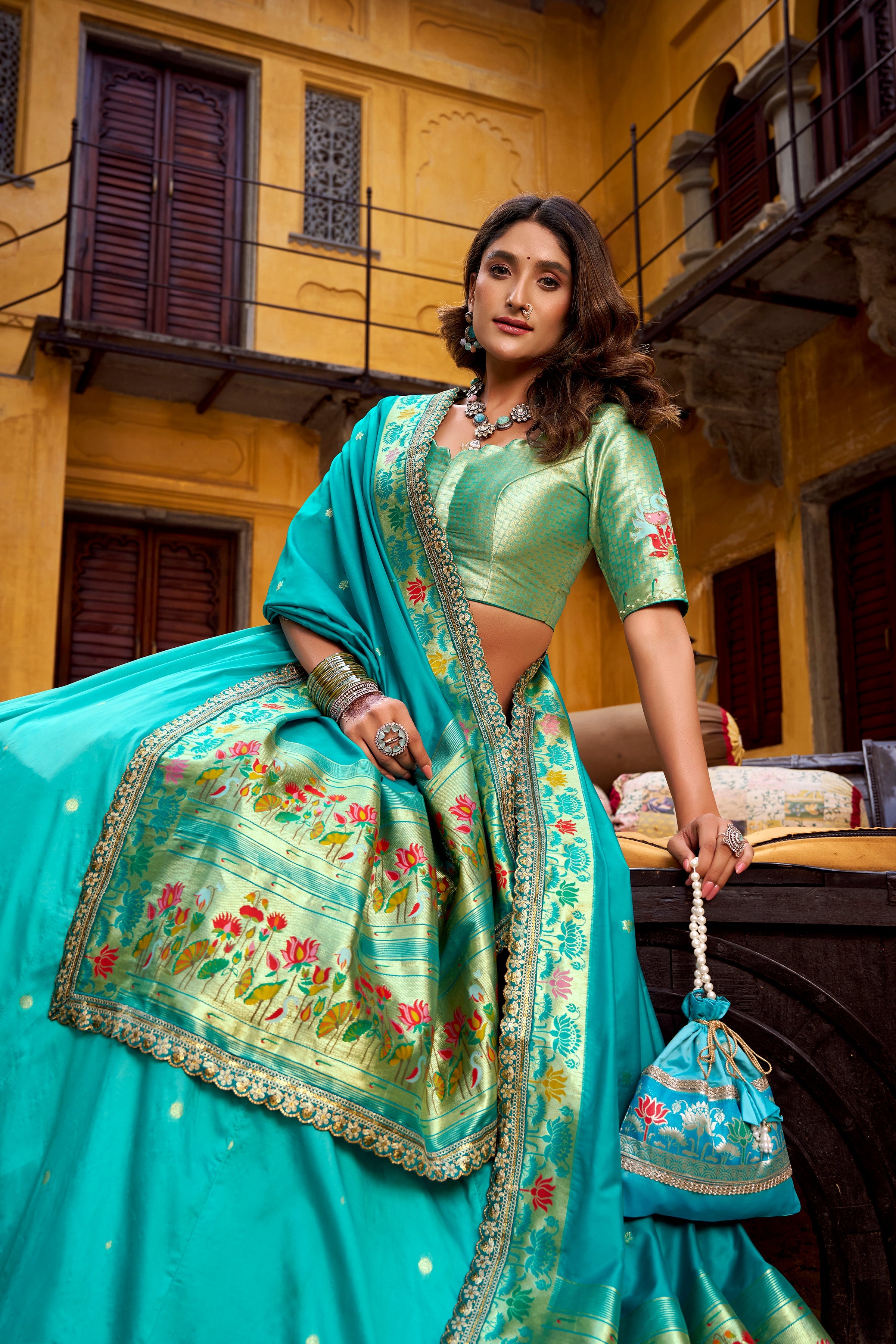 Hamsini sky blue soft silk Paithani lehenga choli with zari embroidered work