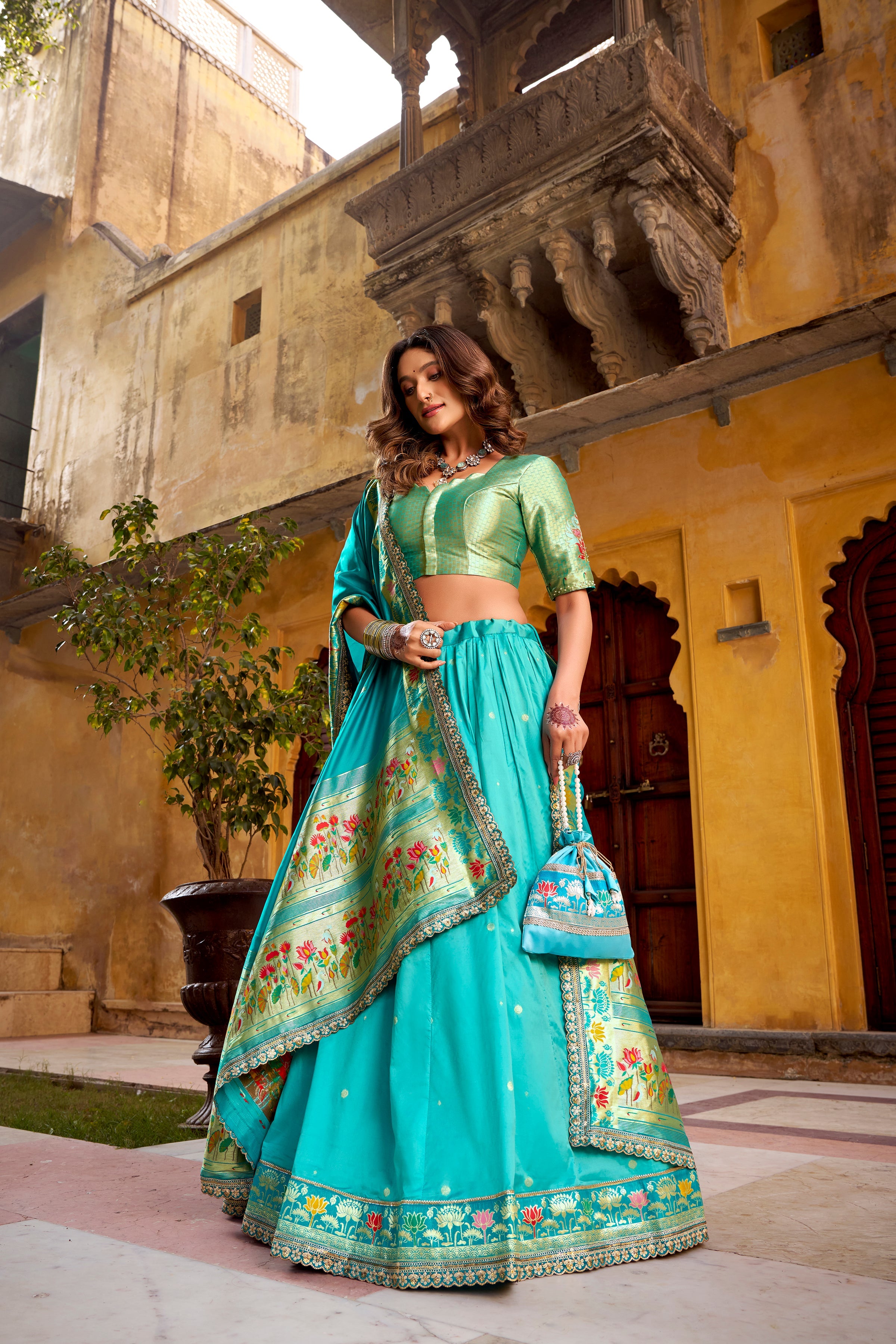 Hamsini sky blue soft silk Paithani lehenga choli with zari embroidered work