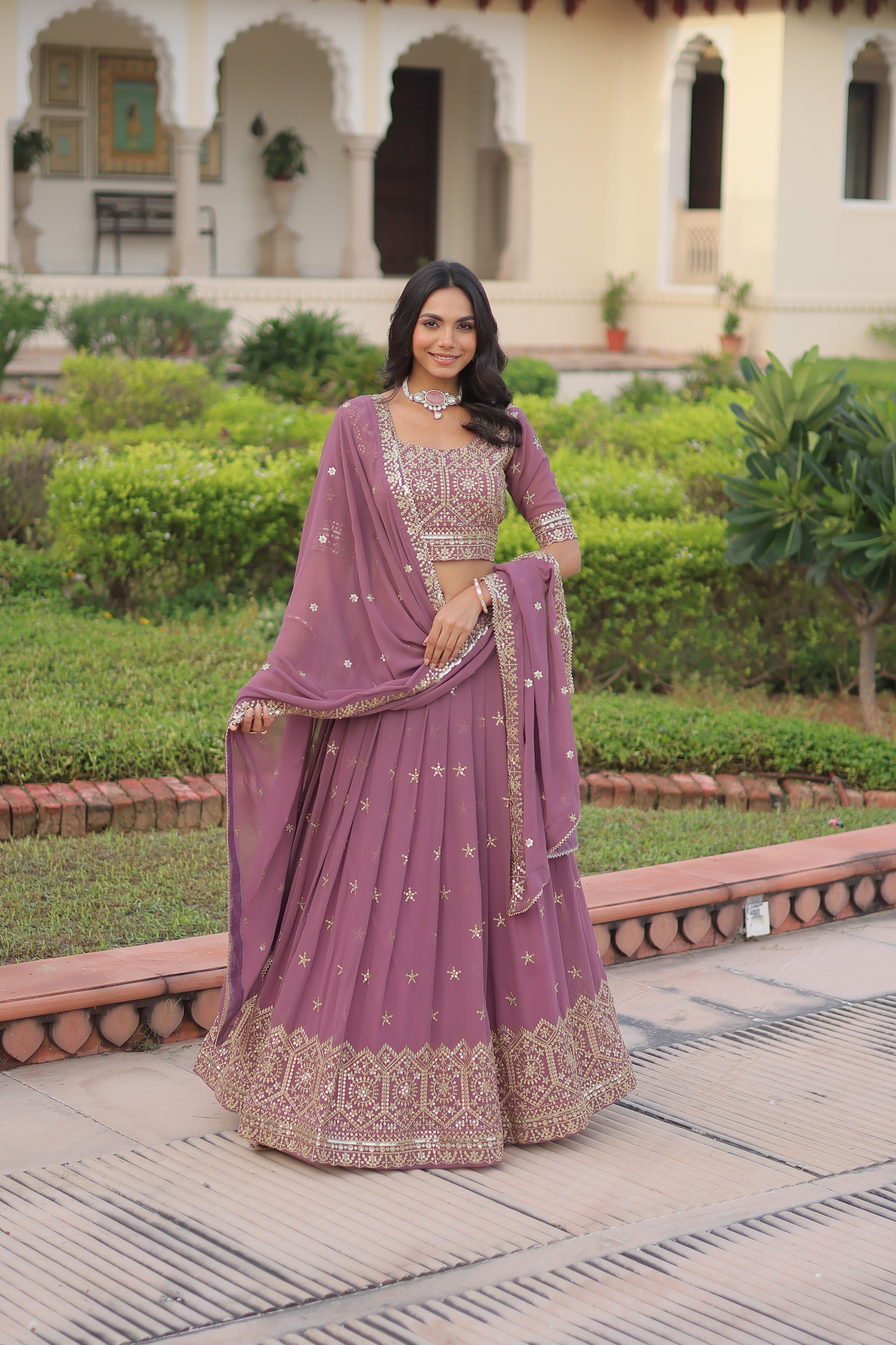 Invi onion pink faux georgette lehenga choli with sequins zari embroidery