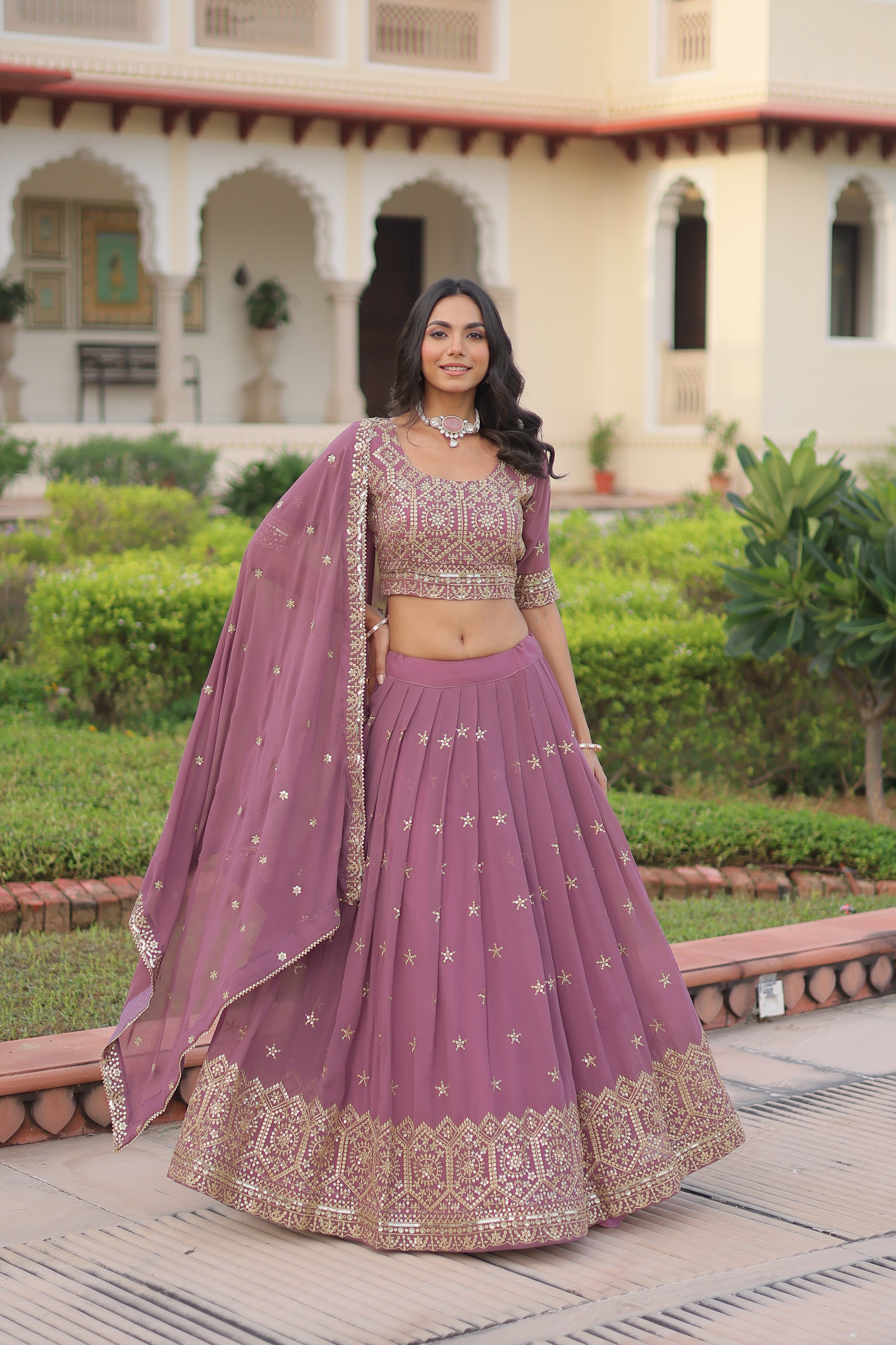 Invi onion pink faux georgette lehenga choli with sequins zari embroidery