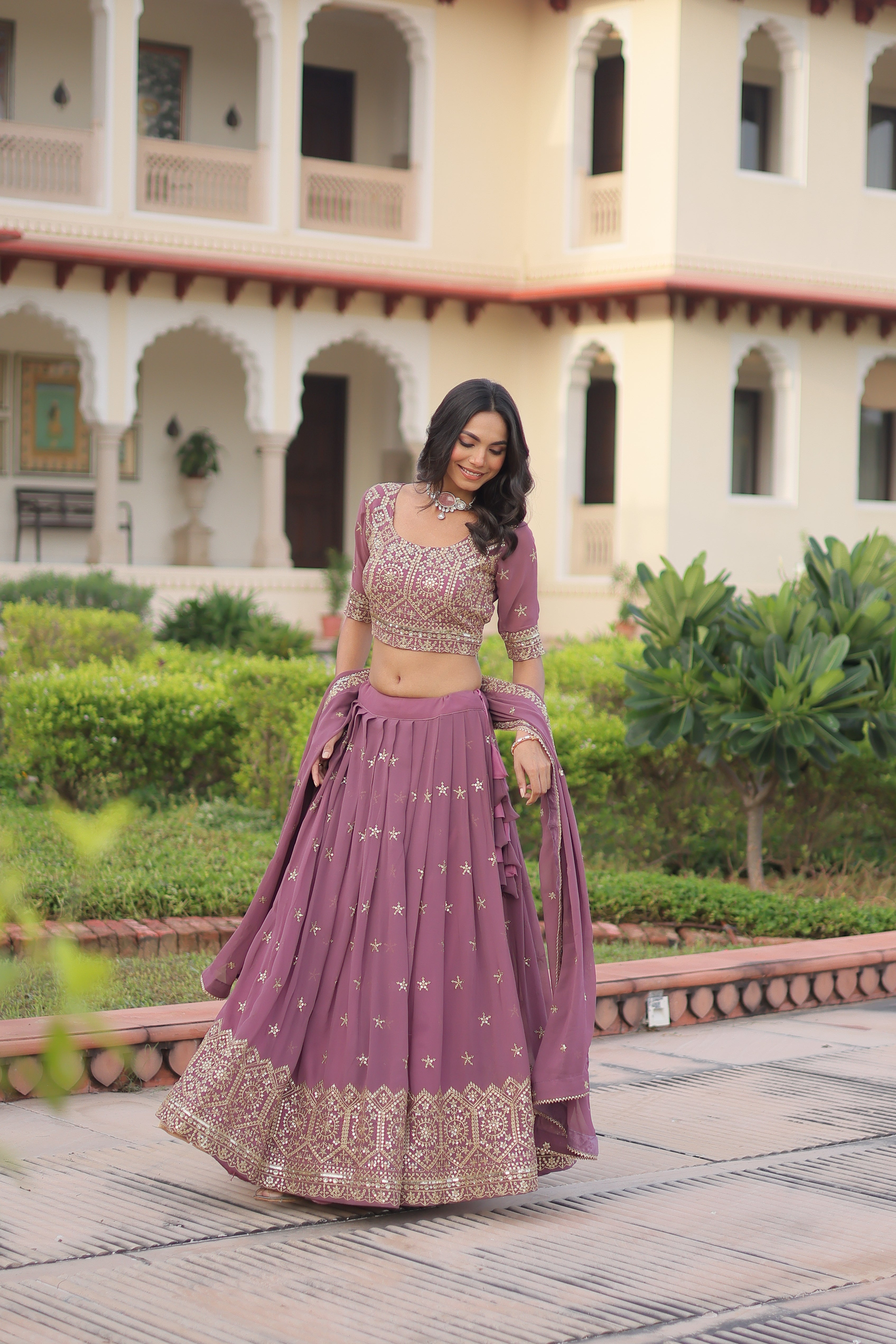 Invi onion pink faux georgette lehenga choli with sequins zari embroidery