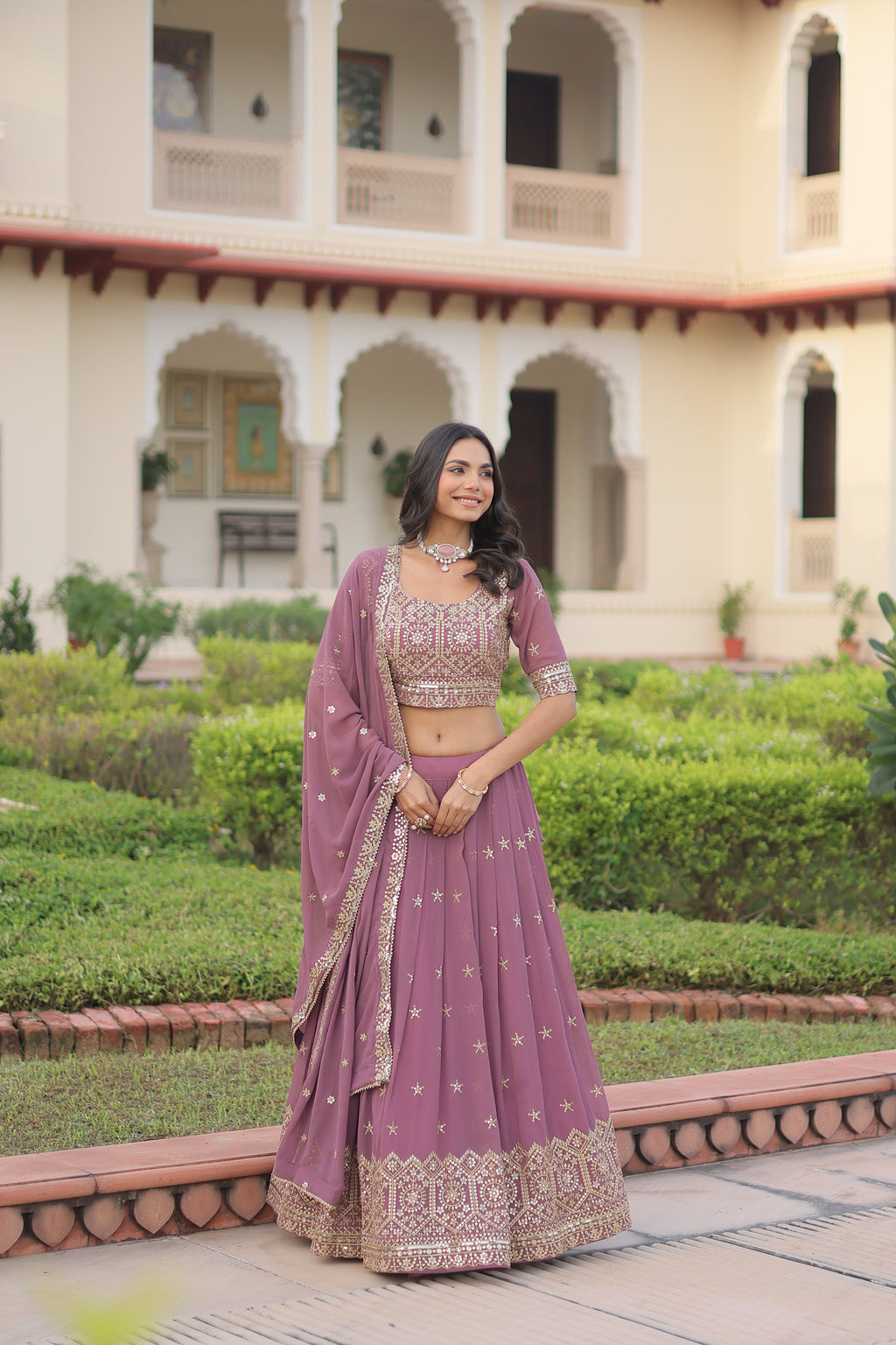Invi onion pink faux georgette lehenga choli with sequins zari embroidery