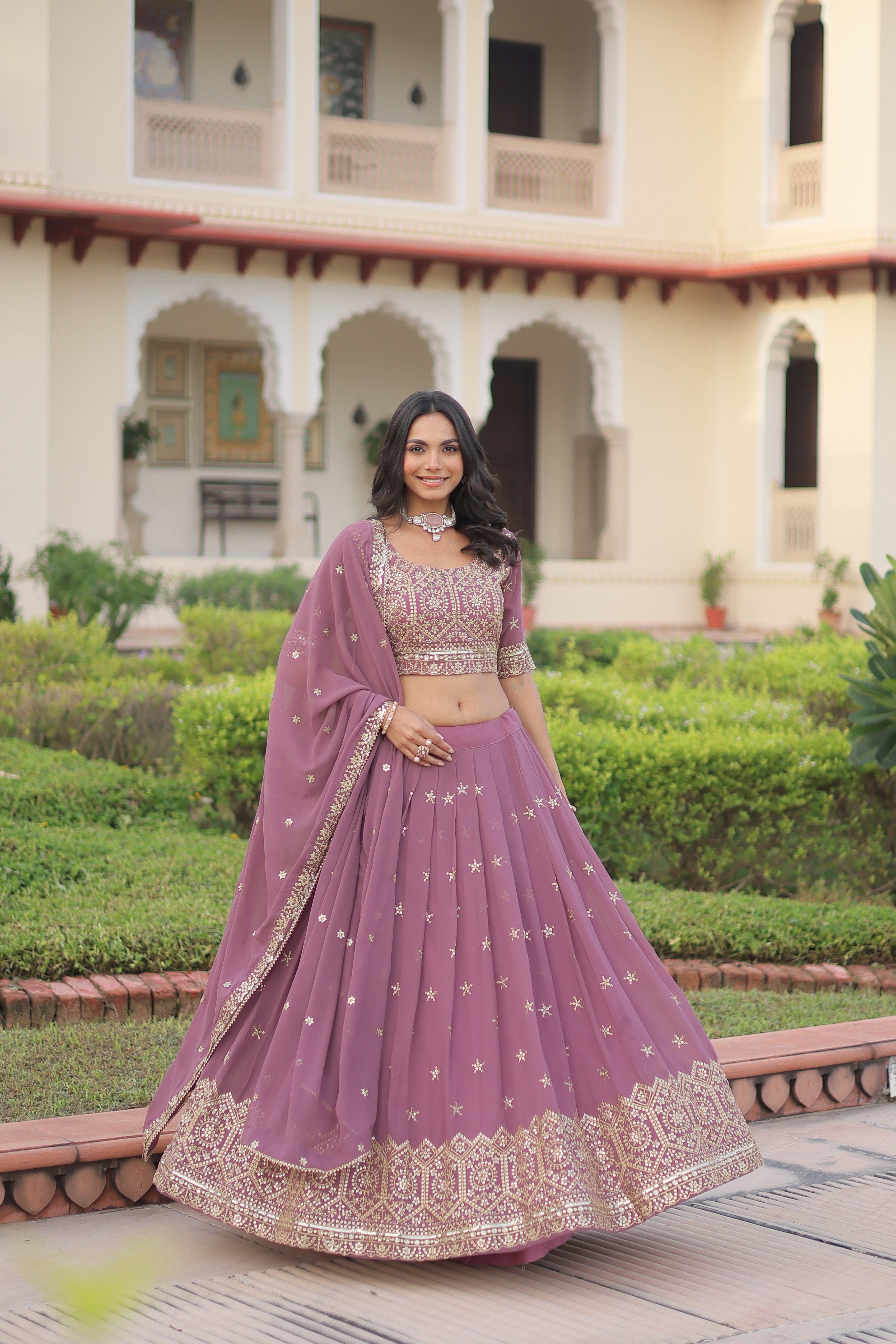 Invi onion pink faux georgette lehenga choli with sequins zari embroidery
