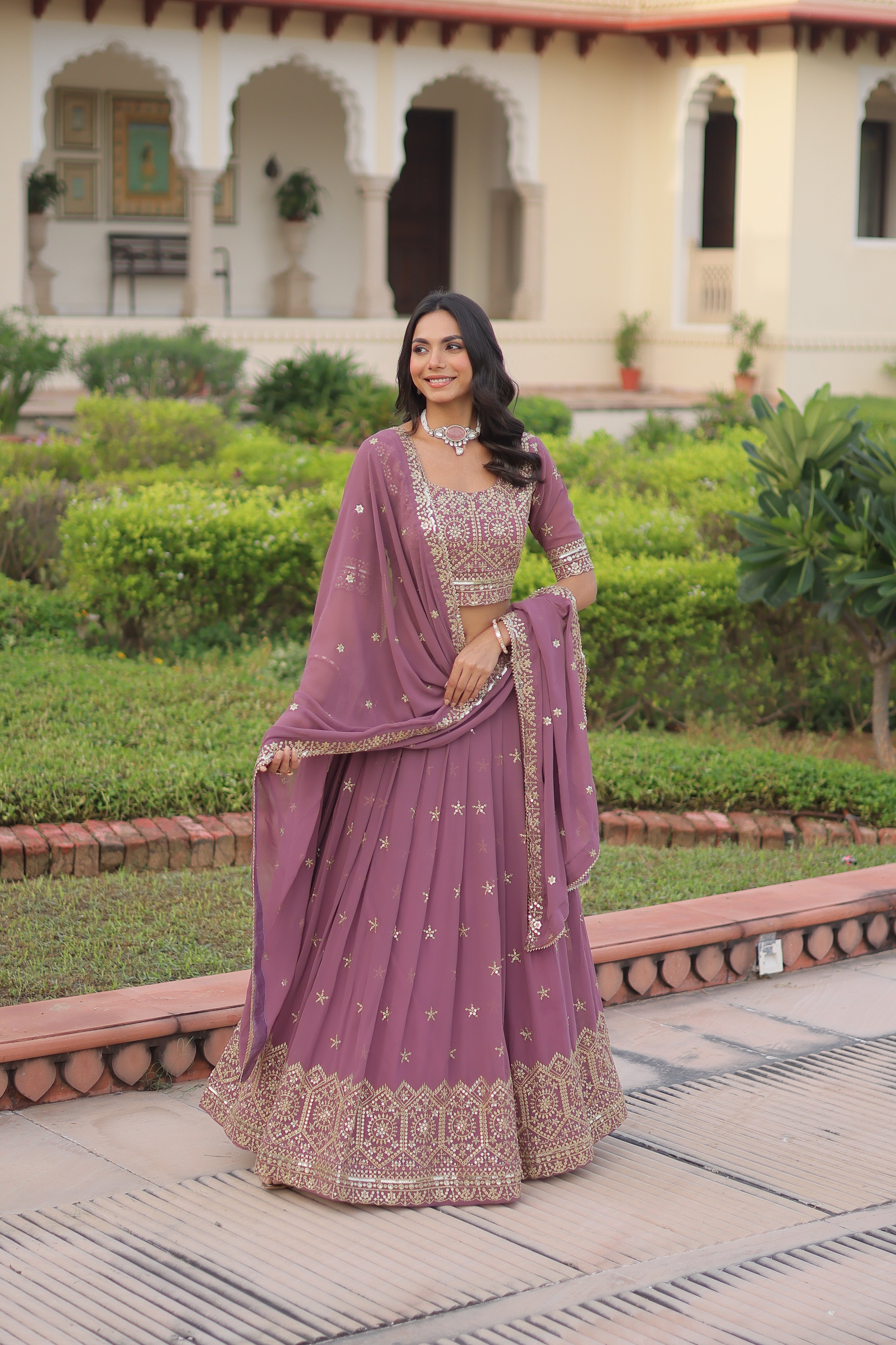 Invi onion pink faux georgette lehenga choli with sequins zari embroidery
