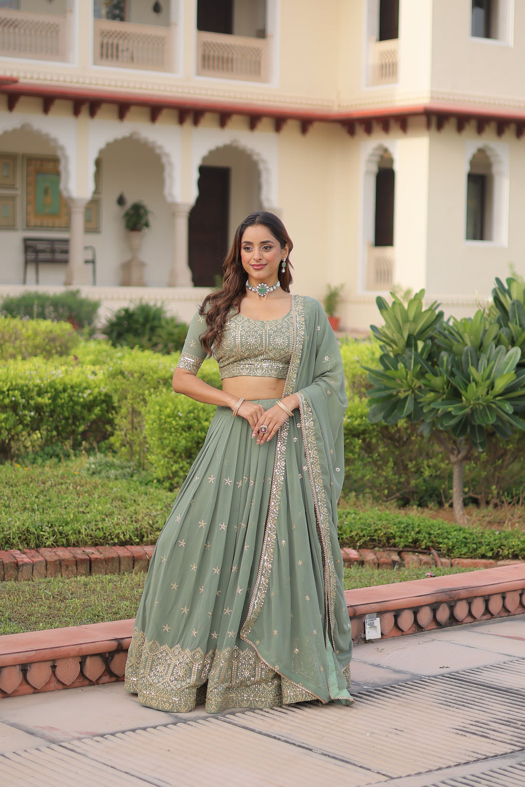 Invi pista green faux georgette lehenga choli with sequins zari embroidery
