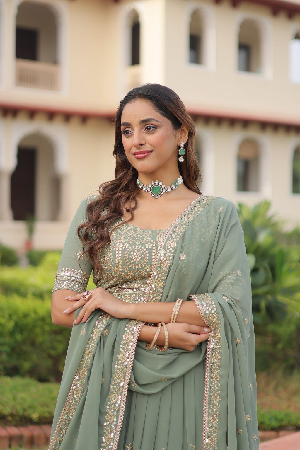 Invi pista green faux georgette lehenga choli with sequins zari embroidery
