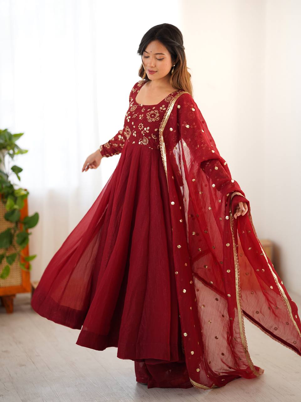 Maroon crunchy silk anarkali suit with embroidered sequins work