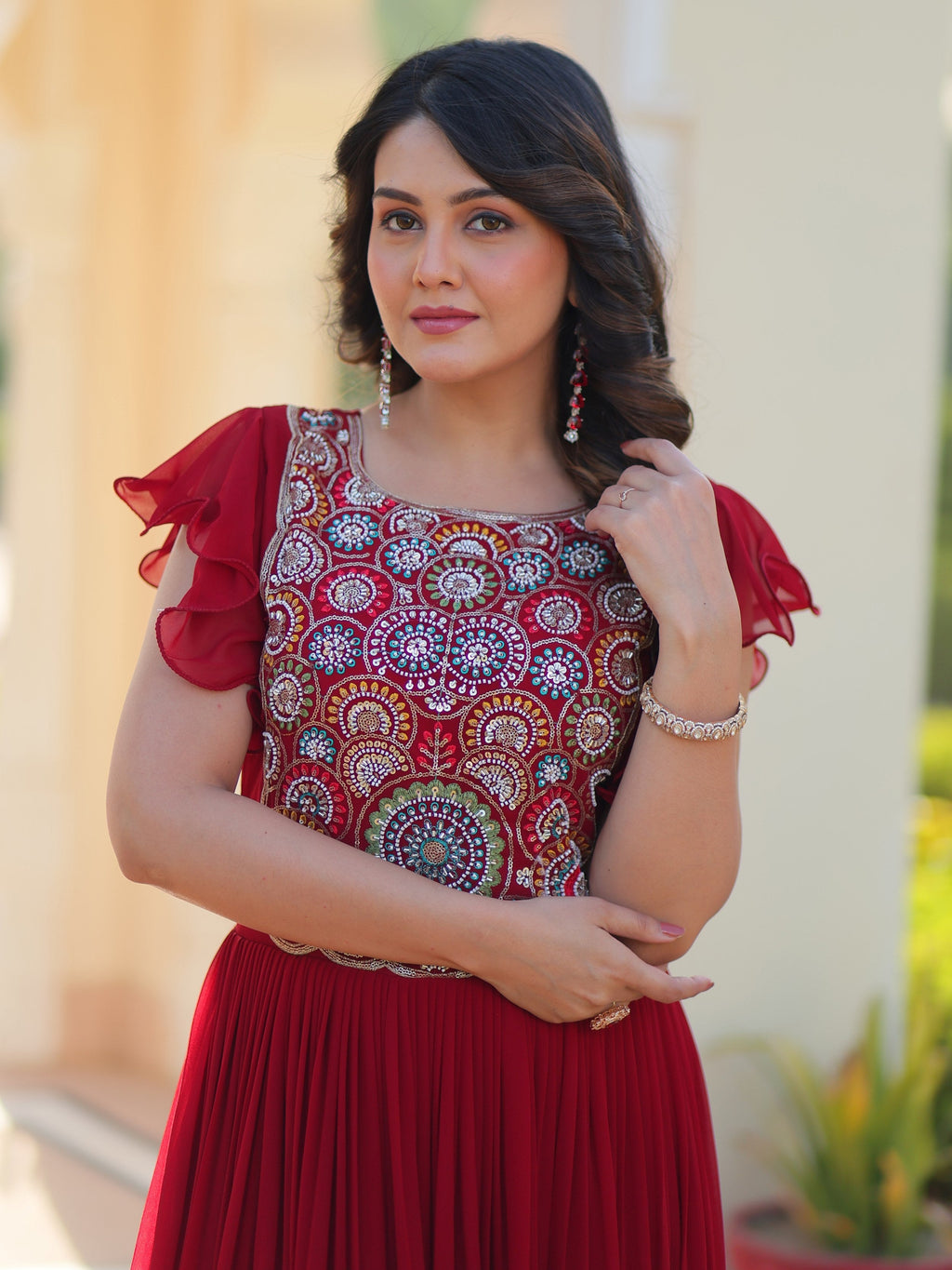 Maroon georgette gown with multithread beads and sequins embroidery