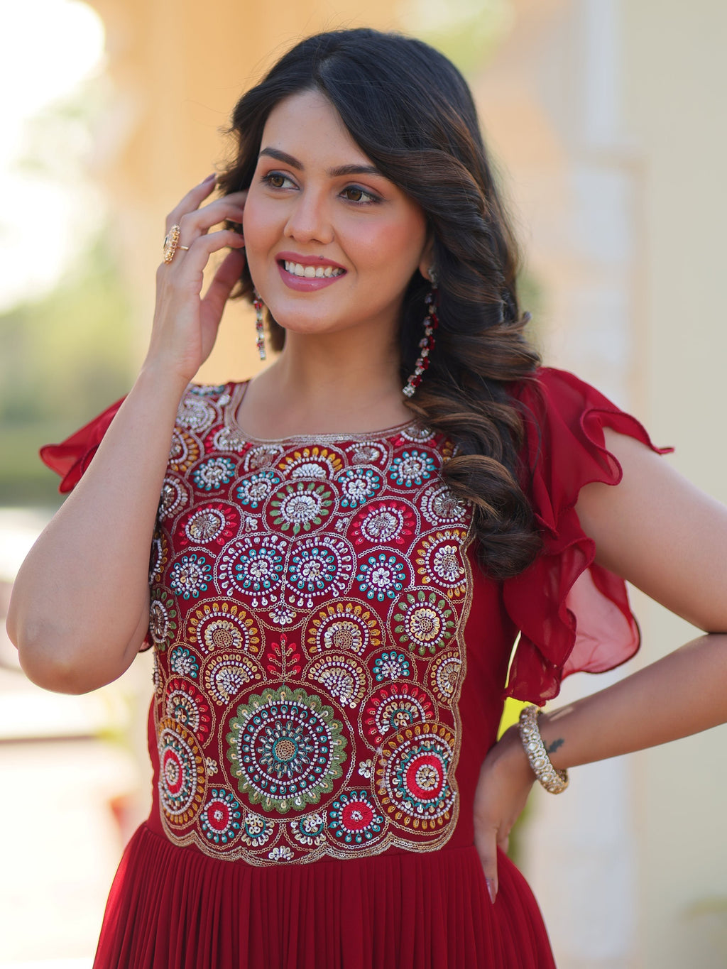 Maroon georgette gown with multithread beads and sequins embroidery