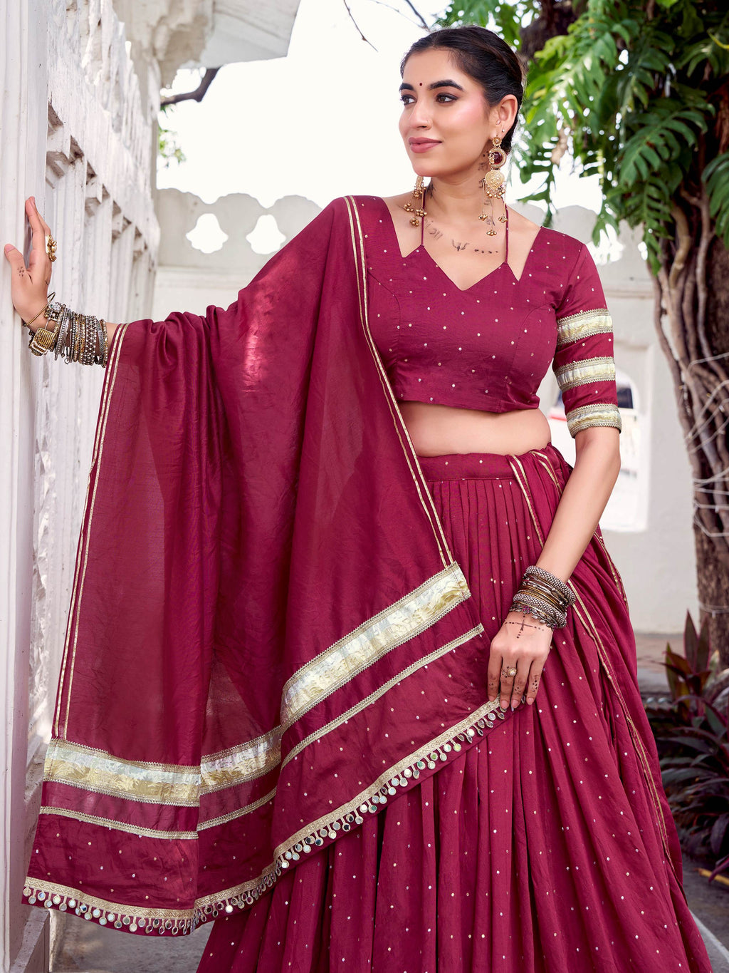 Maroon Chanderi lehenga choli with zari weaving and embossed lace