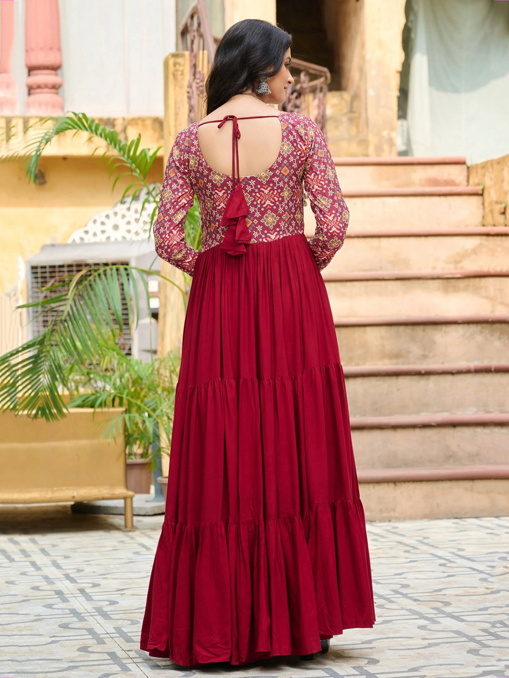 Maroon pure rayon flair gown with kutchi gamthi embroidery