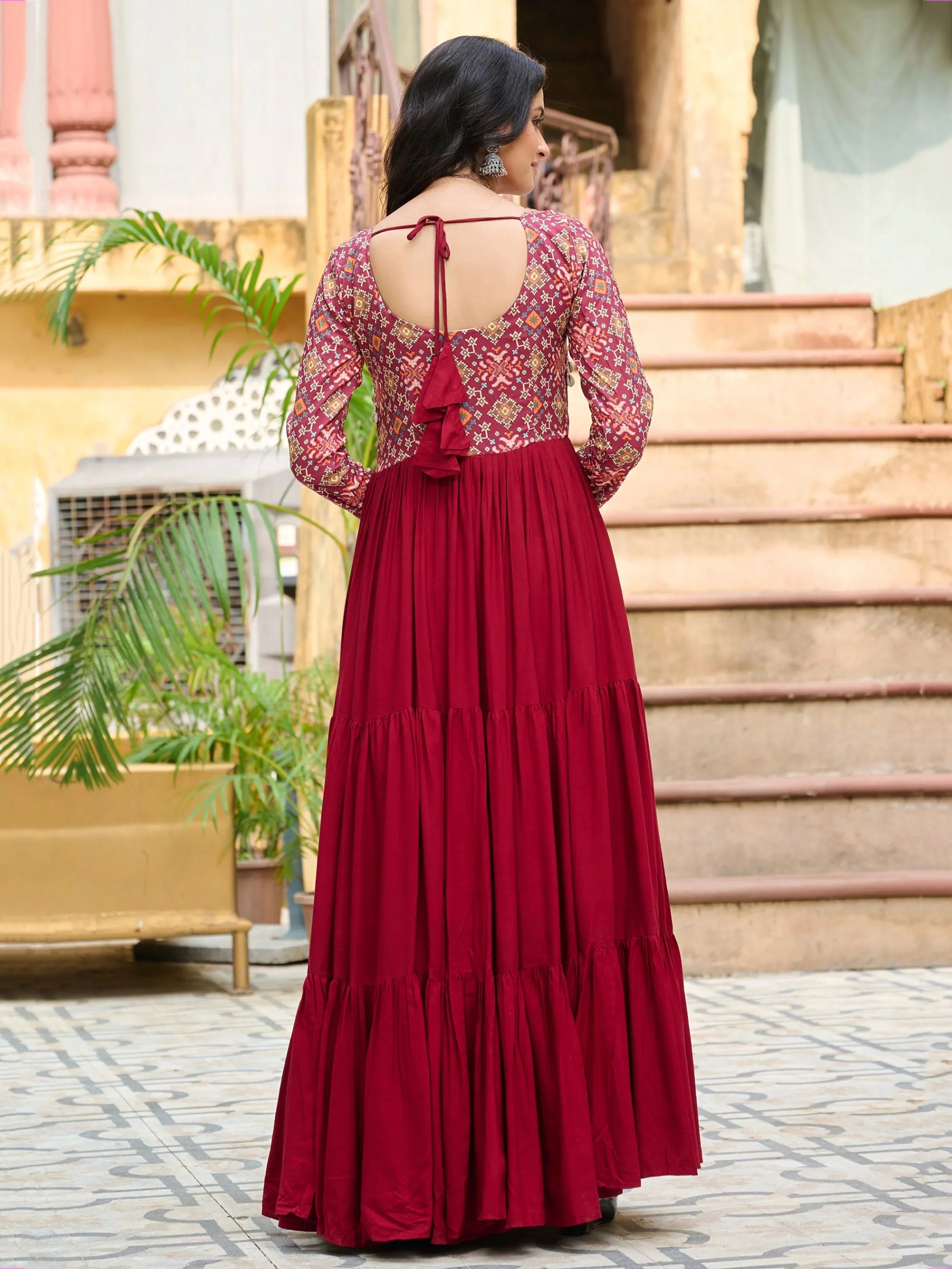 Maroon pure rayon flair gown with kutchi gamthi embroidery