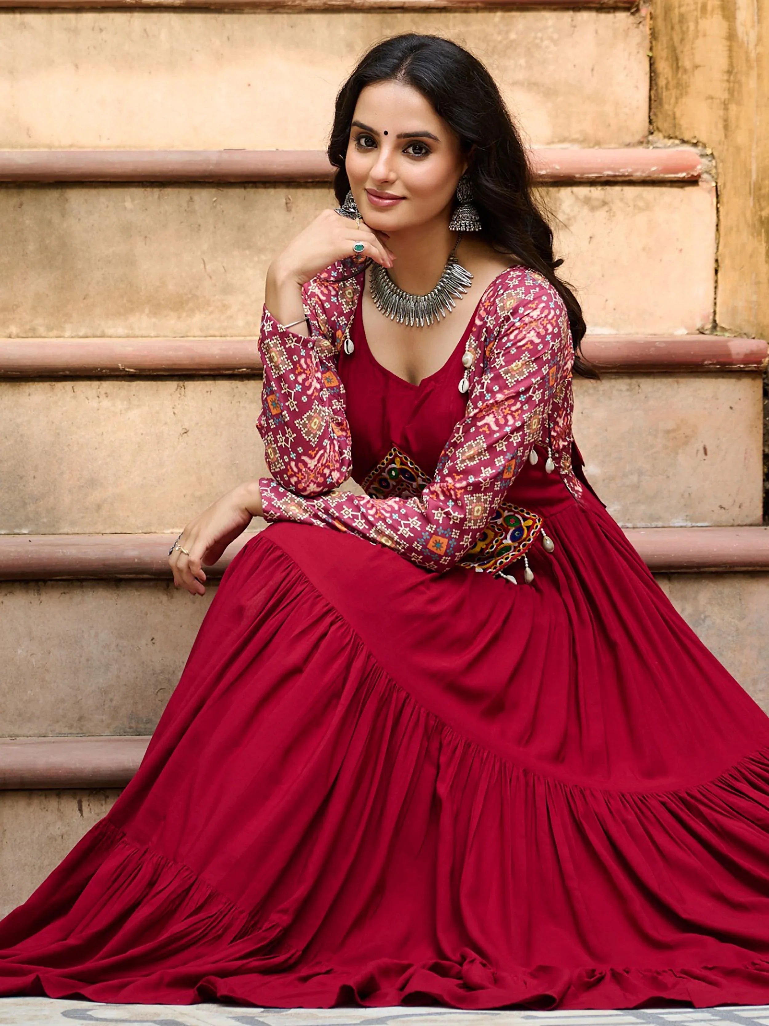 Maroon pure rayon flair gown with kutchi gamthi embroidery