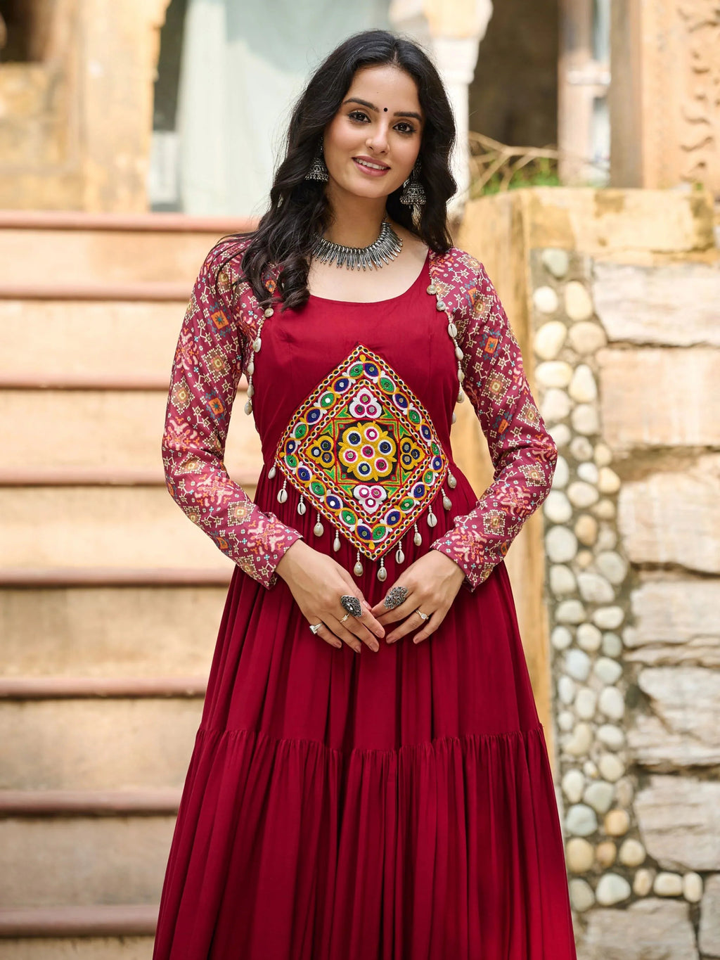 Maroon pure rayon flair gown with kutchi gamthi embroidery