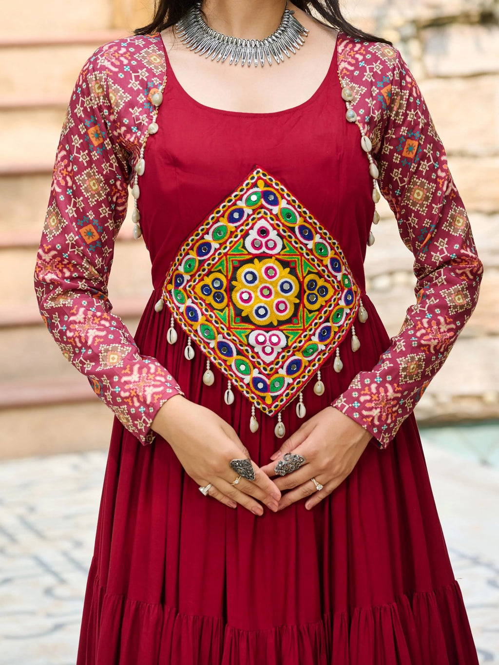 Maroon pure rayon flair gown with kutchi gamthi embroidery