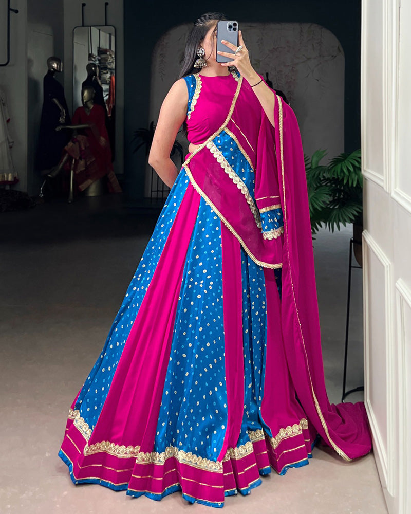 Mauve pink Tasar silk Bandhej print lehenga with lace blouse and dupatta