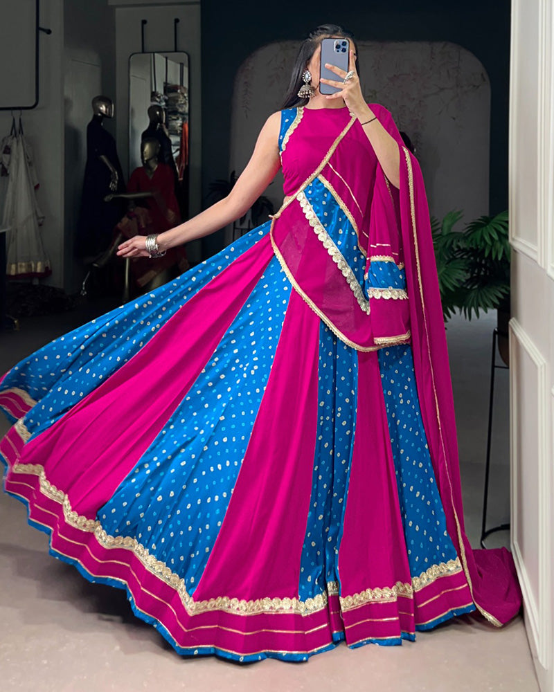 Mauve pink Tasar silk Bandhej print lehenga with lace blouse and dupatta