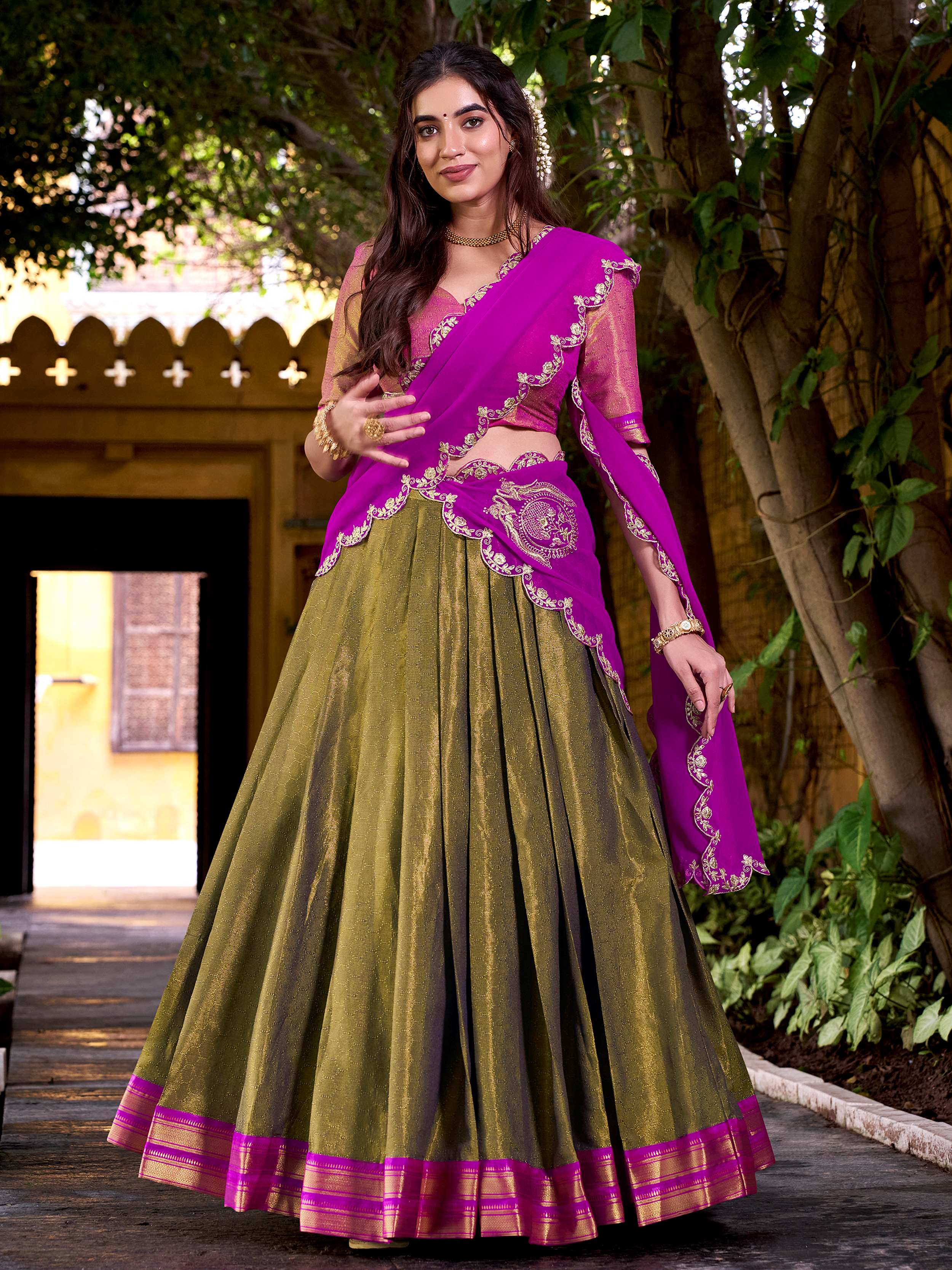 Mehendi green kanchipuram silk lehenga choli with zari weaving and sequins work
