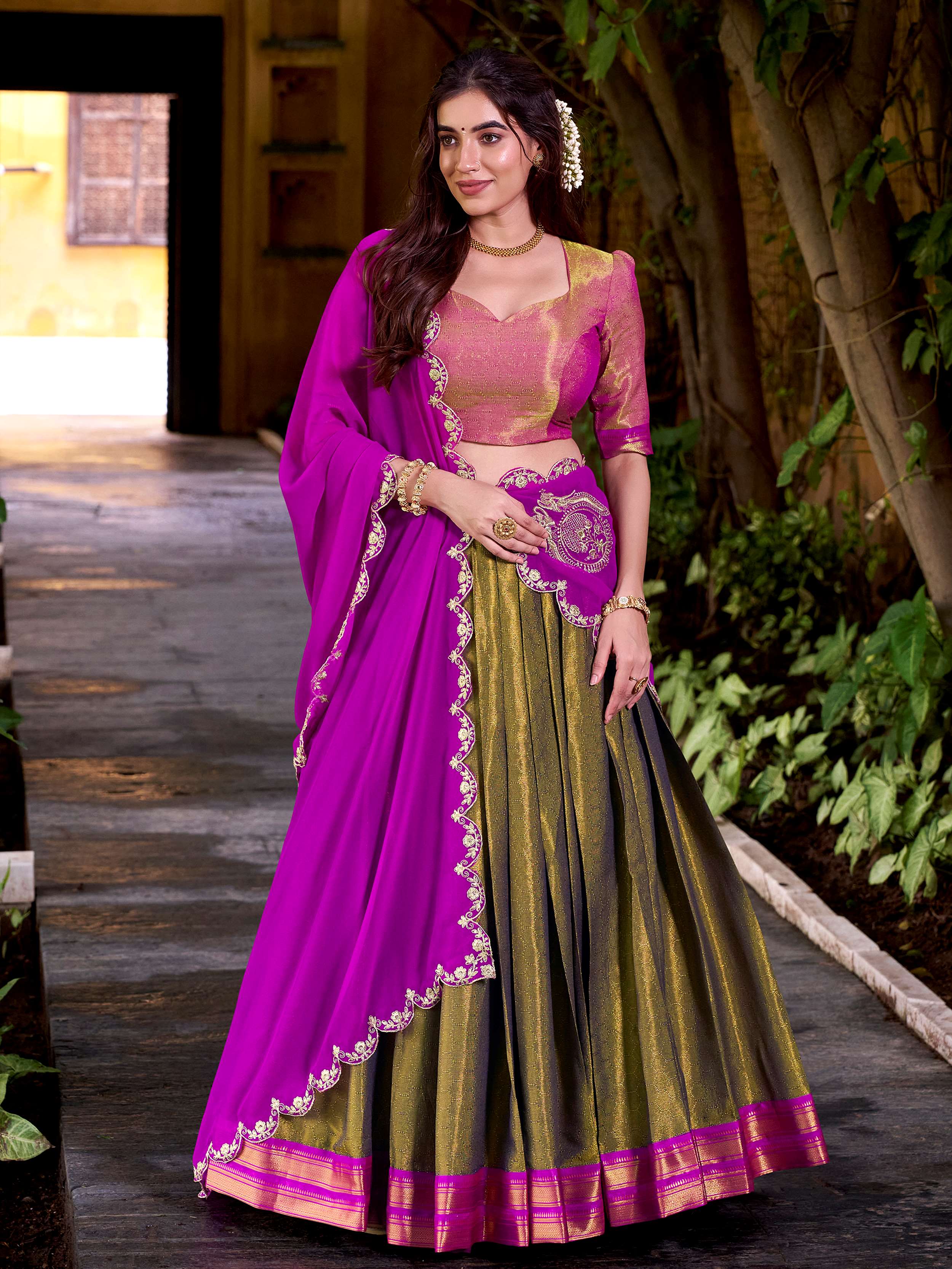 Mehendi green kanchipuram silk lehenga choli with zari weaving and sequins work
