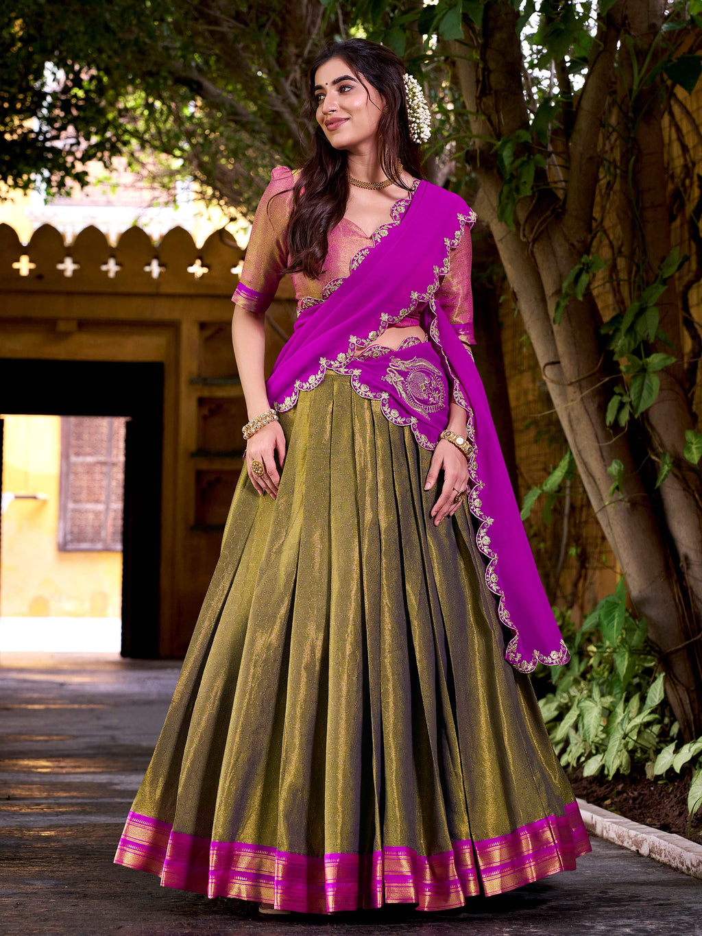 Mehendi green kanchipuram silk lehenga choli with zari weaving and sequins work
