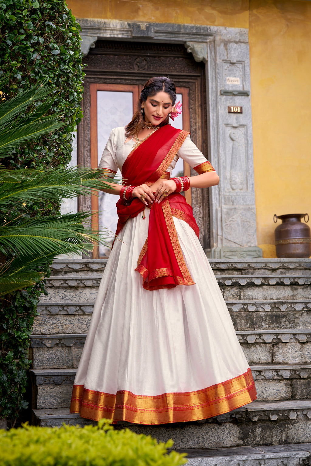 Mira white poly cotton half saree lehenga with zari weaving work