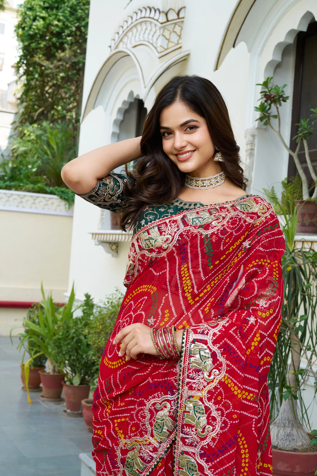 Mrinalini red gota patti work pure bandhani saree