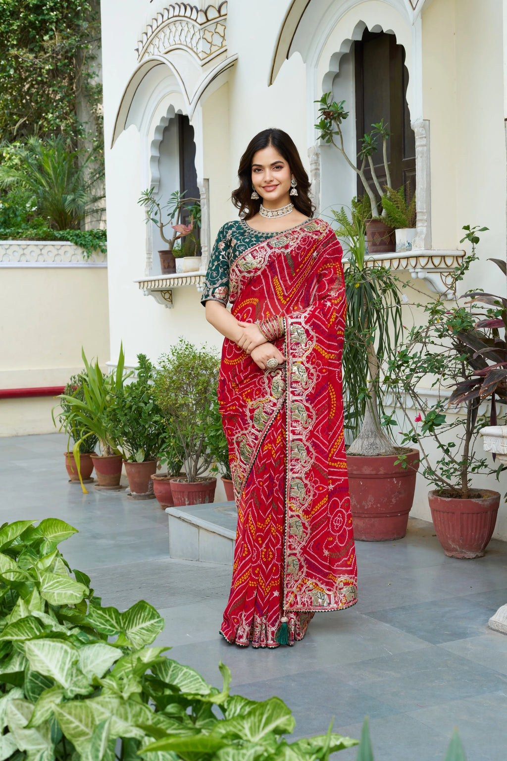 Mrinalini red gota patti work pure bandhani saree
