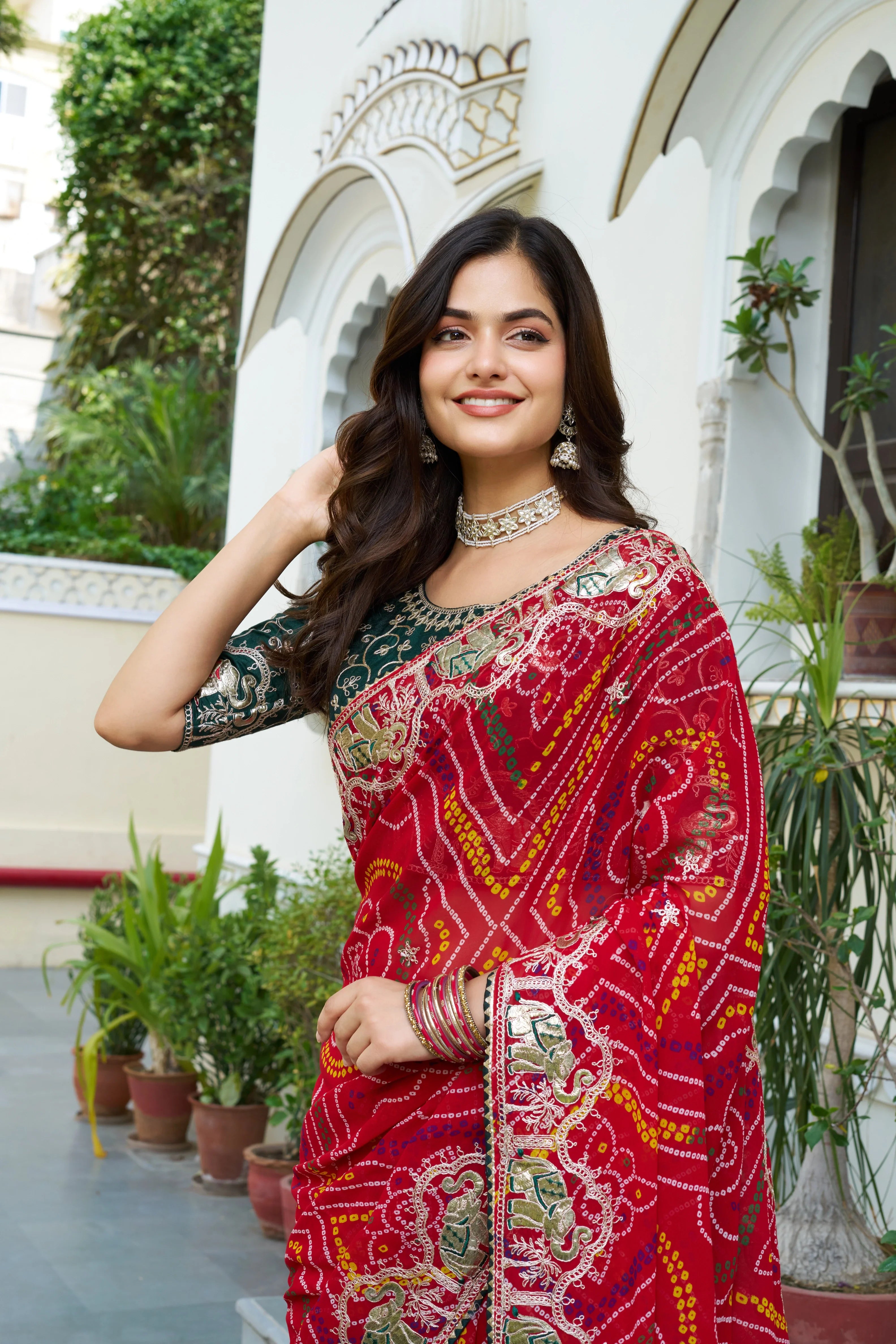 Mrinalini red gota patti work pure bandhani saree