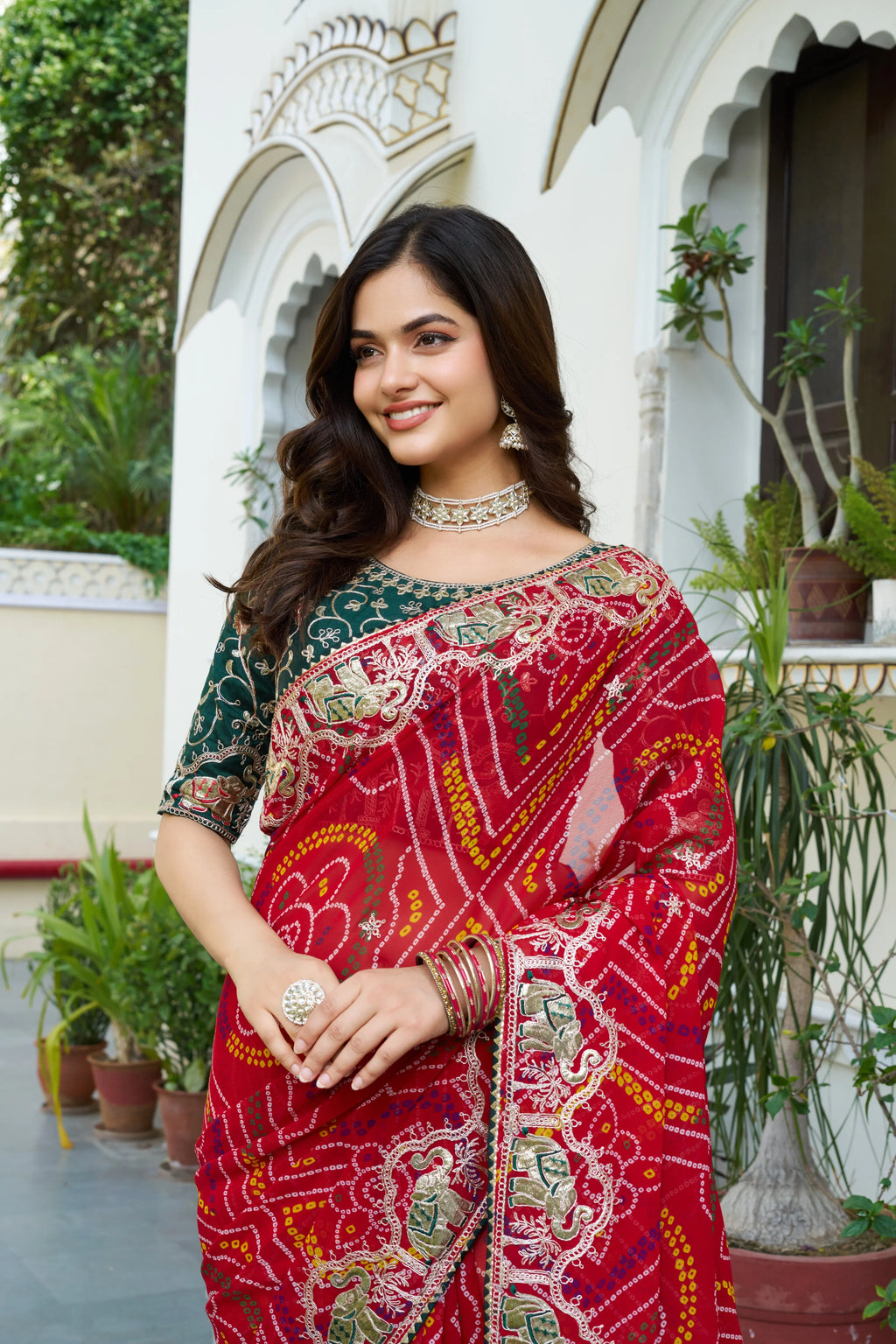 Mrinalini red gota patti work pure bandhani saree