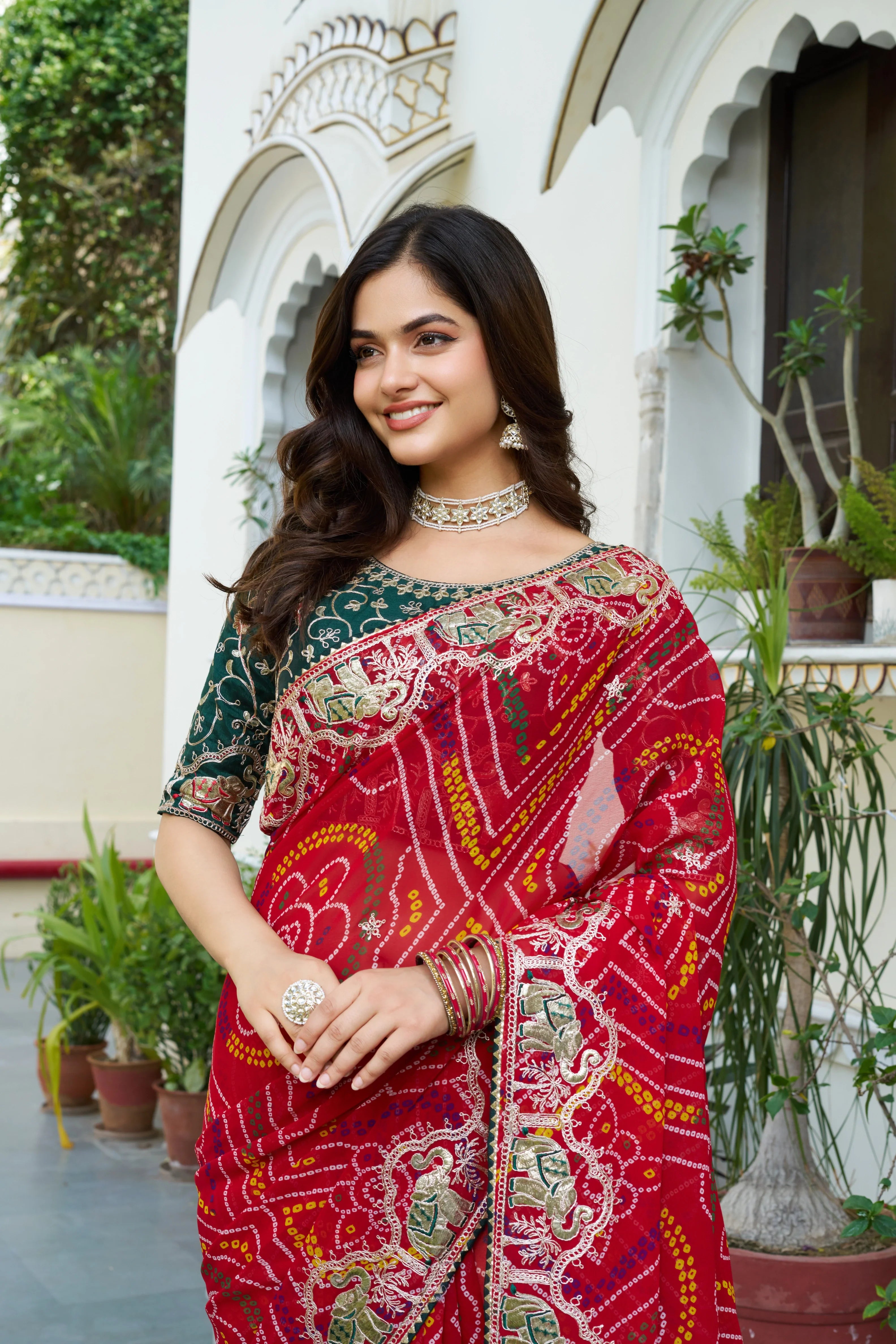 Mrinalini red gota patti work pure bandhani saree