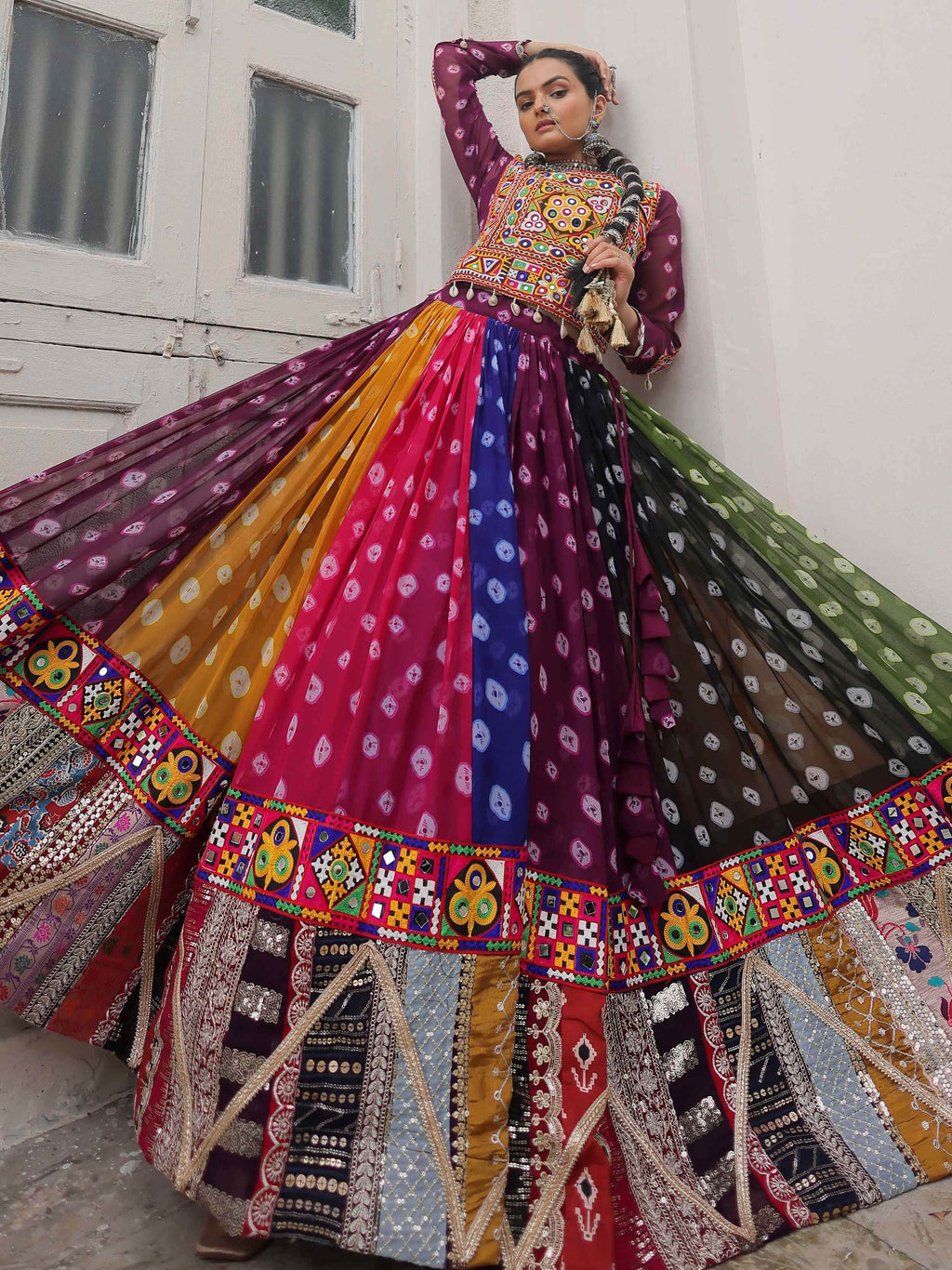 Multicolor georgette Bandhani print and Gamthi embellished work lehenga choli