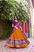 Mustard yellow Tussar silk Patola print foil work gotta patti lehenga choli