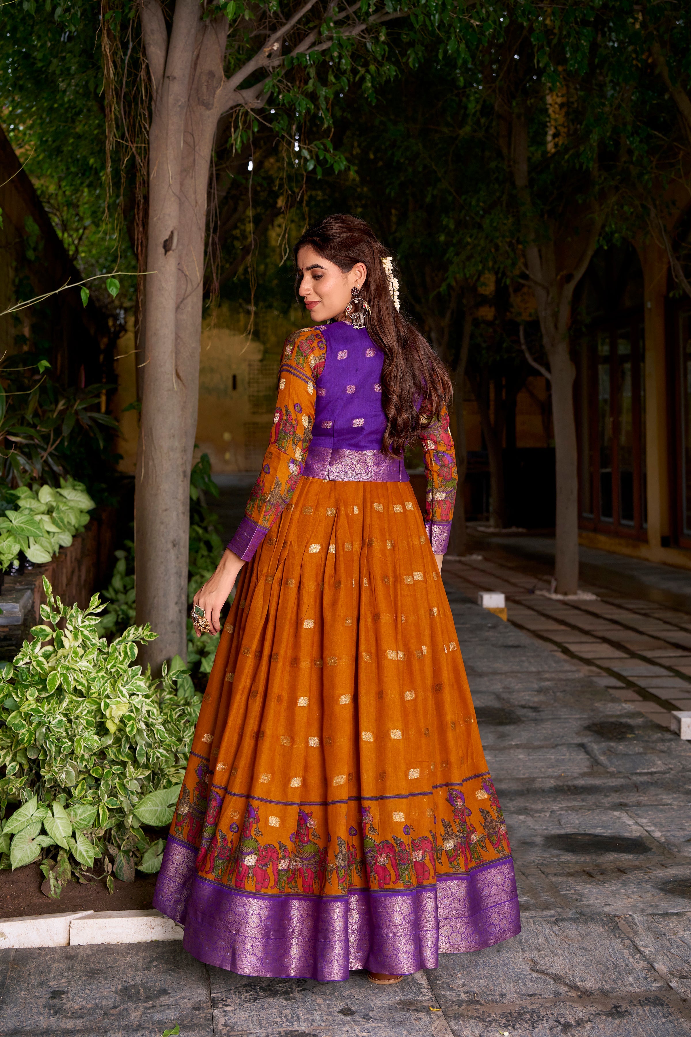 Mustard yellow poly cotton Kalamkari print gown with zari weaving koti