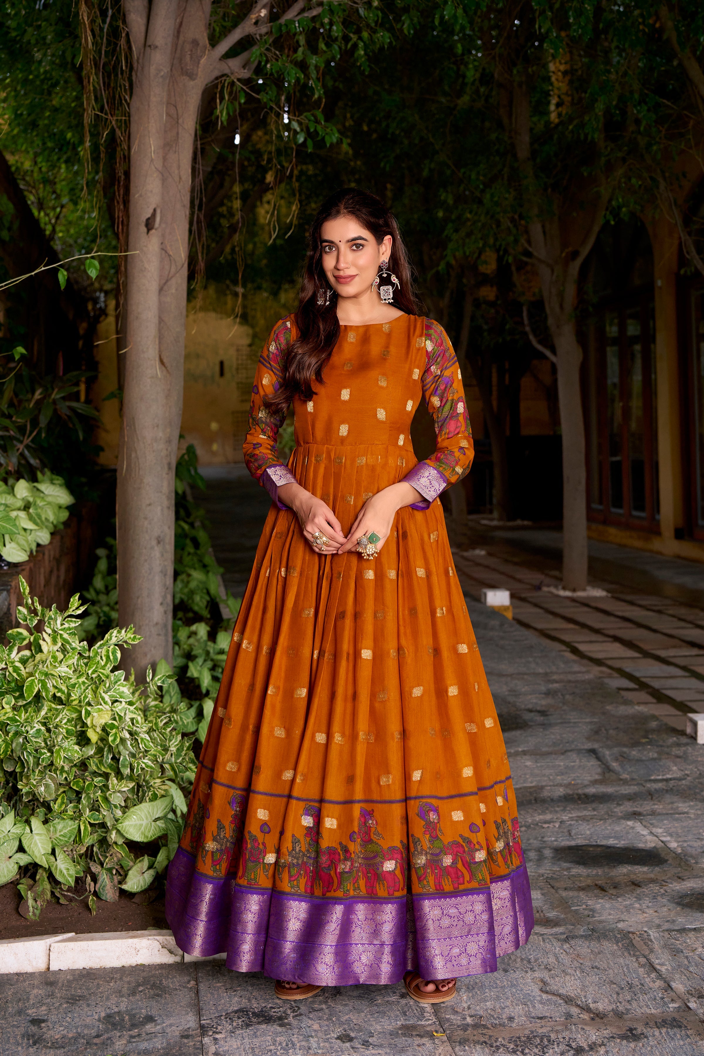 Mustard yellow poly cotton Kalamkari print gown with zari weaving koti