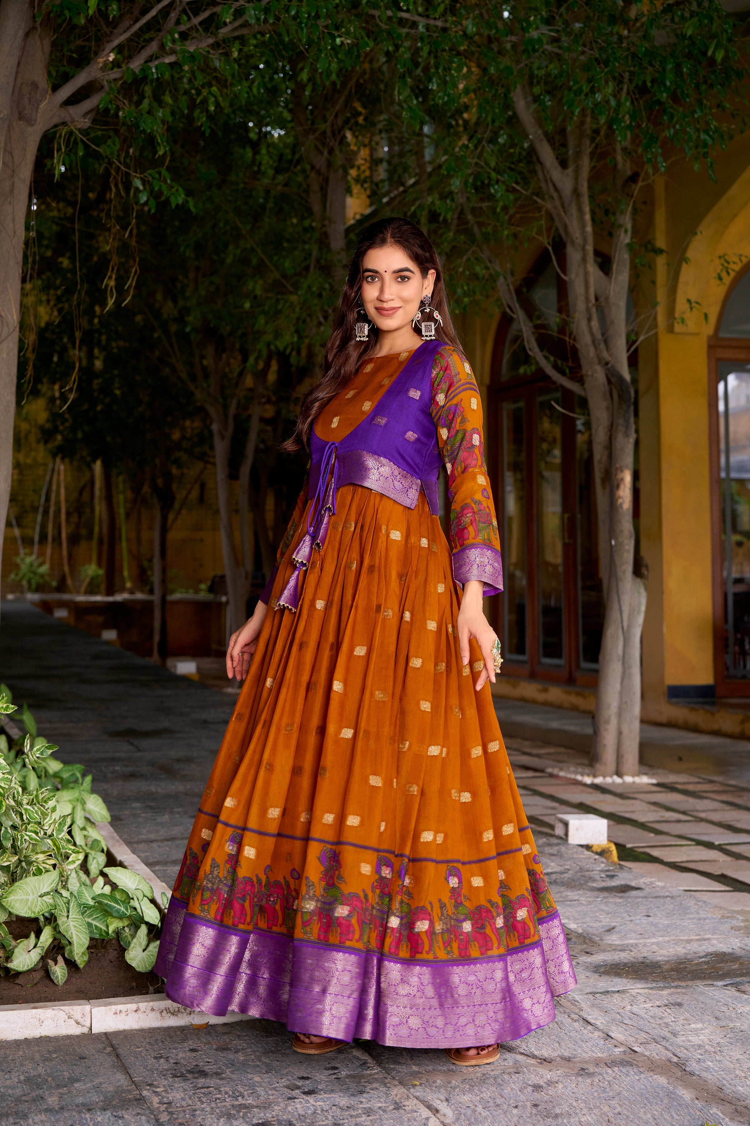 Mustard yellow poly cotton Kalamkari print gown with zari weaving koti