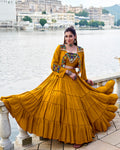 Mustard yellow rayon lehenga set with mirror embroidered blouse and koti