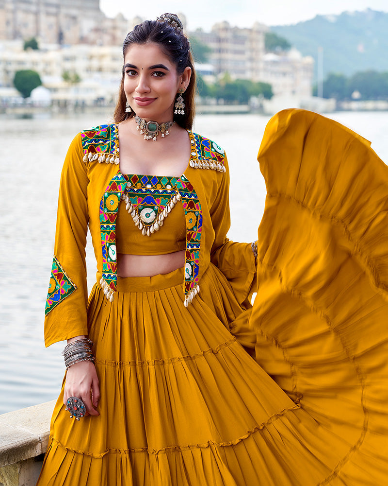 Mustard yellow rayon lehenga set with mirror embroidered blouse and koti