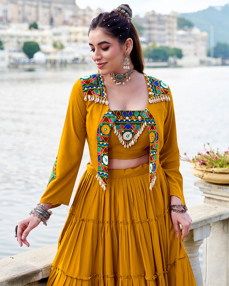 Mustard yellow rayon lehenga set with mirror embroidered blouse and koti