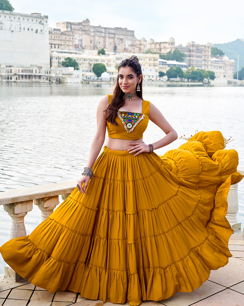 Mustard yellow rayon lehenga set with mirror embroidered blouse and koti