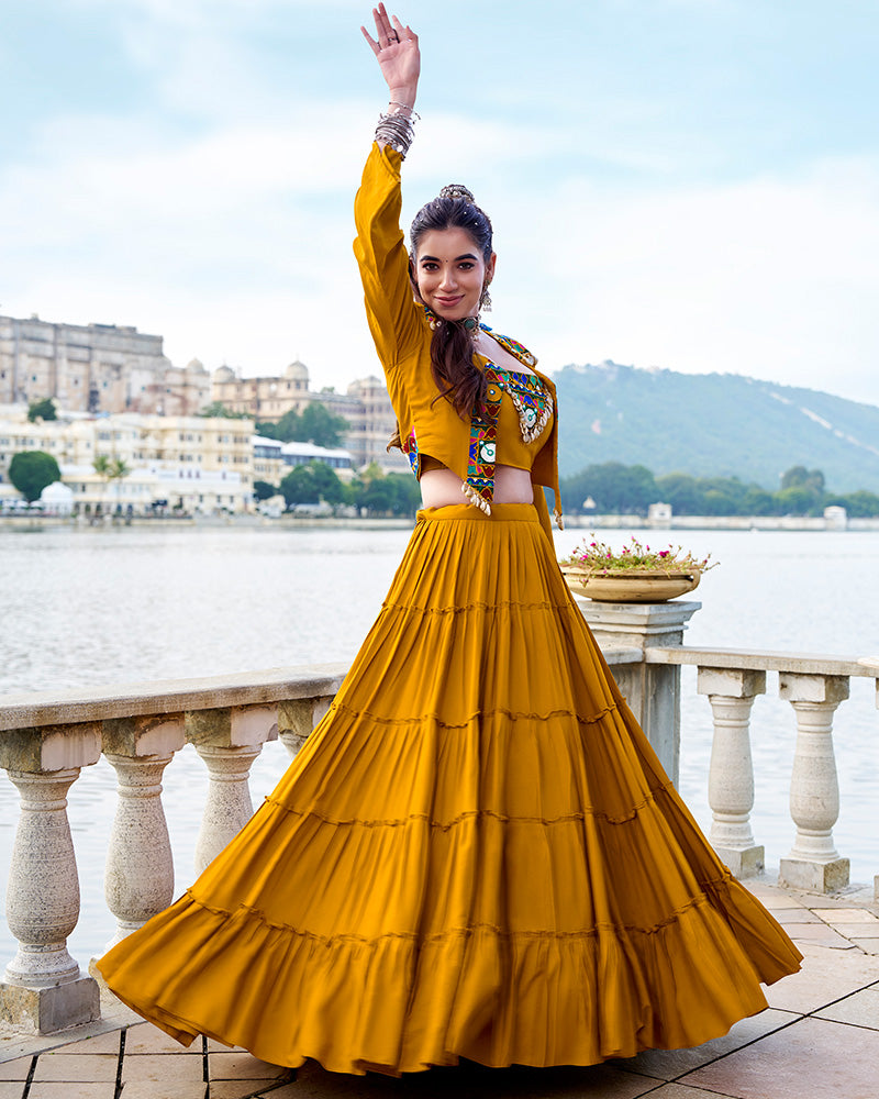Mustard yellow rayon lehenga set with mirror embroidered blouse and koti
