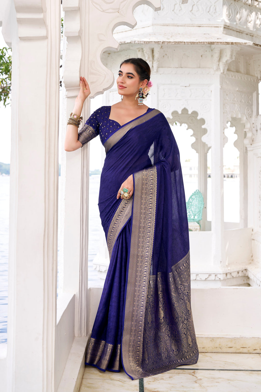 Navy blue chinon self-printed zari weaving saree with blouse